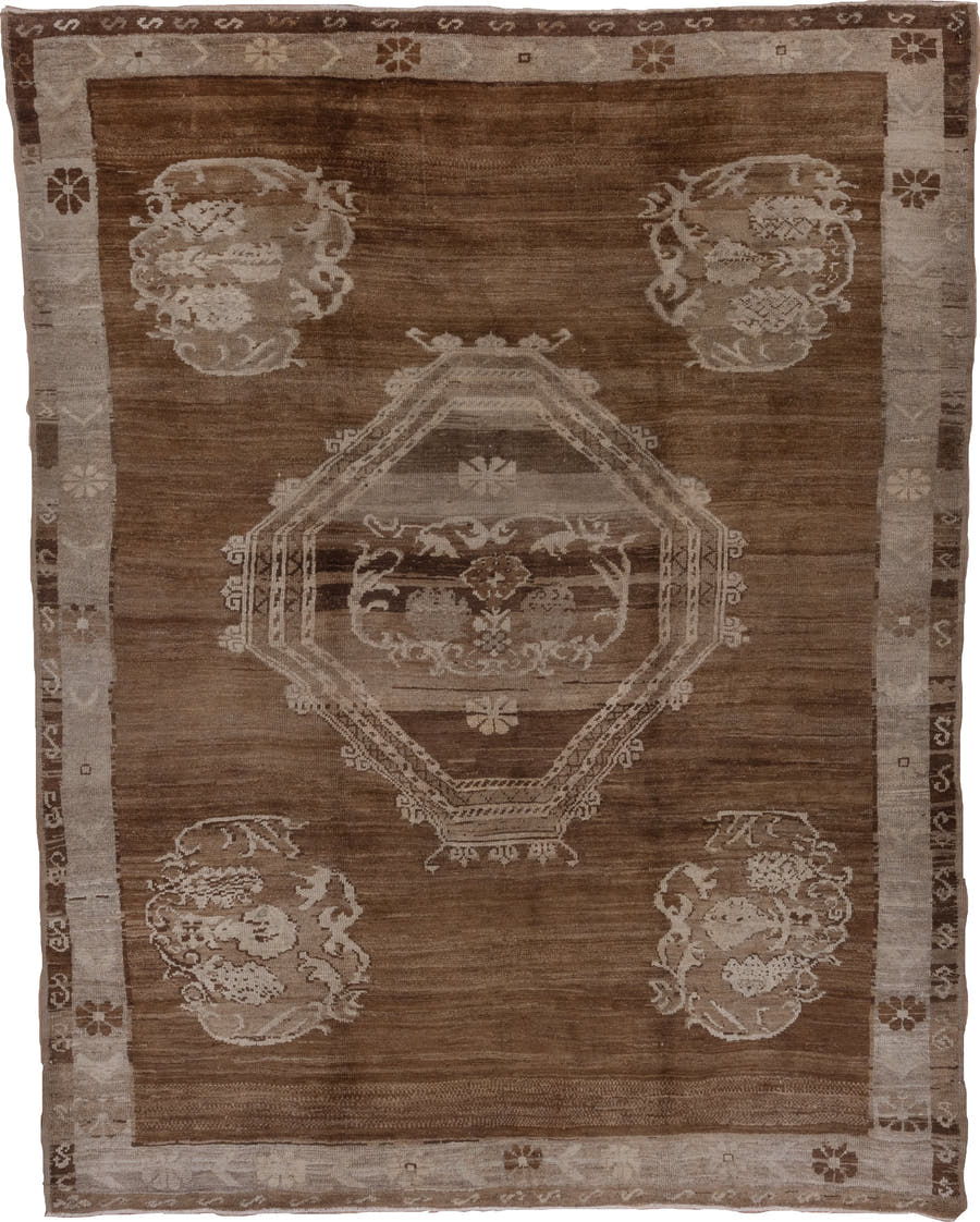 7' x 9' one-of-a-kind handmade vintage Oushak rug. Color palette: brown, taupe, ivory, beige, camel, gray