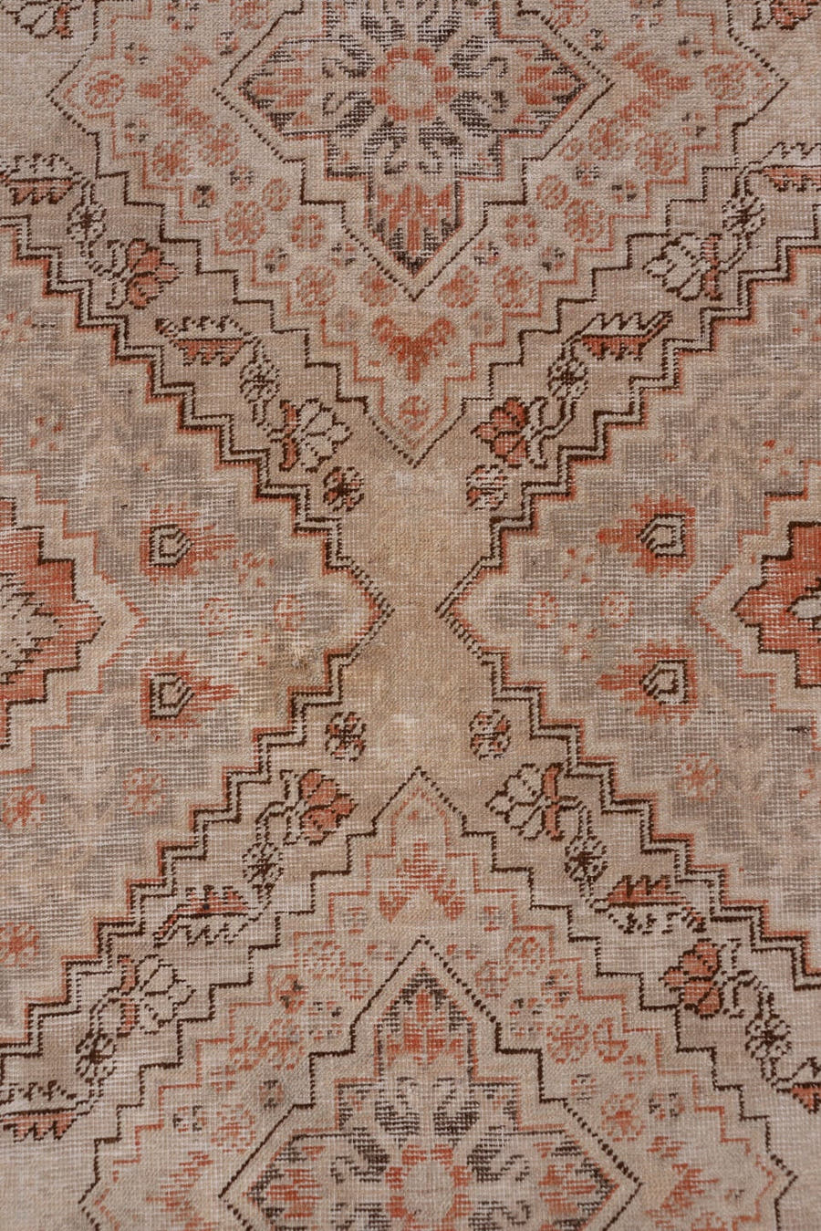 5' x 9' one-of-a-kind handmade antique Khotan medium size rug. Color palette: ivory, taupe, terra cotta, brown, peach