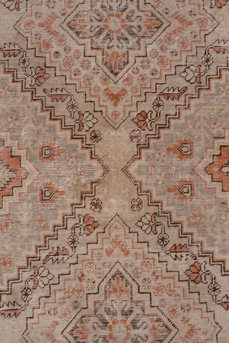5' x 9' one-of-a-kind handmade antique Khotan medium size rug. Color palette: ivory, taupe, terra cotta, brown, peach