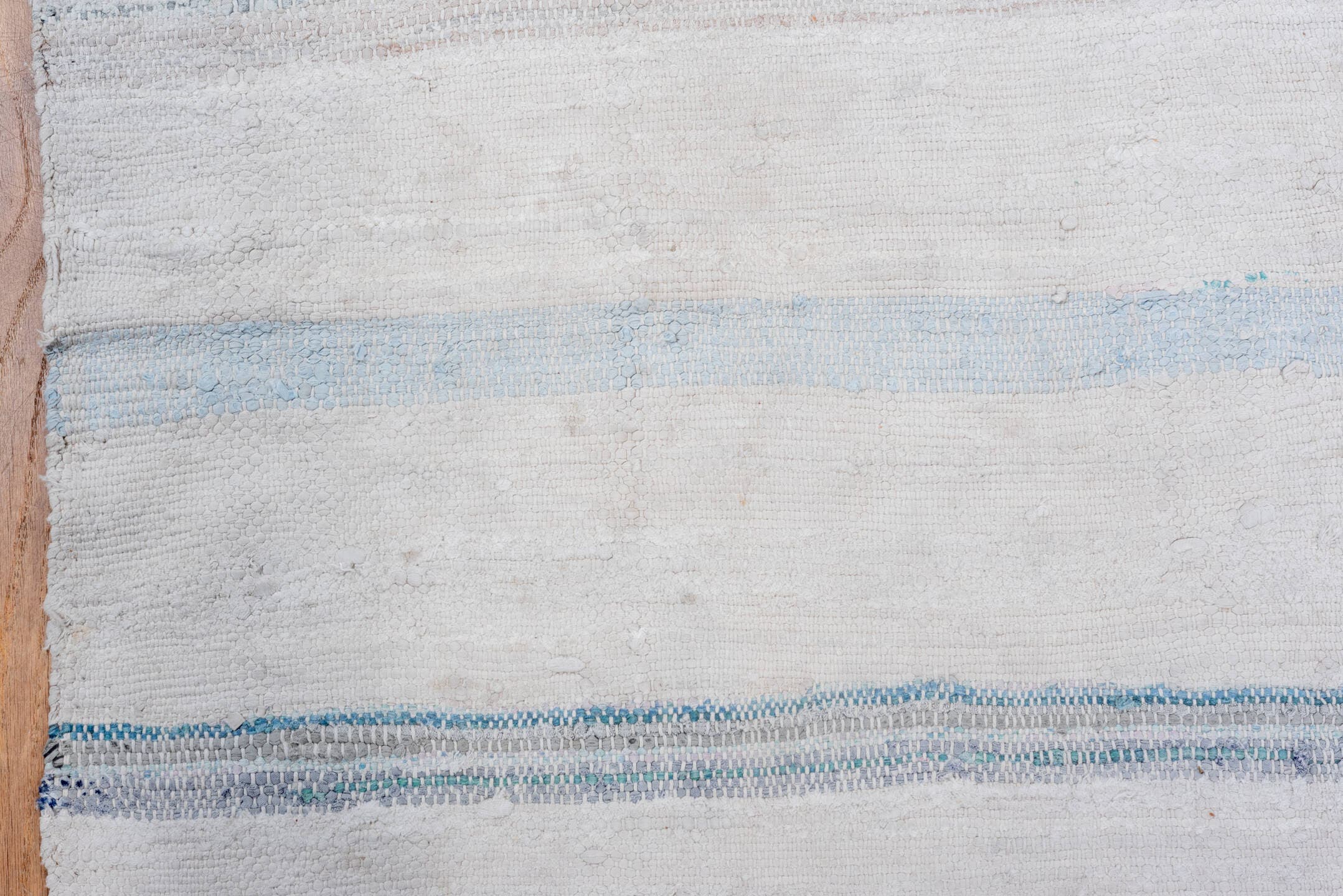 5' x 10' one-of-a-kind handmade vintage Rag Rug medium size rug. Color palette: ivory, pale blue, sky blue, charcoal, blush