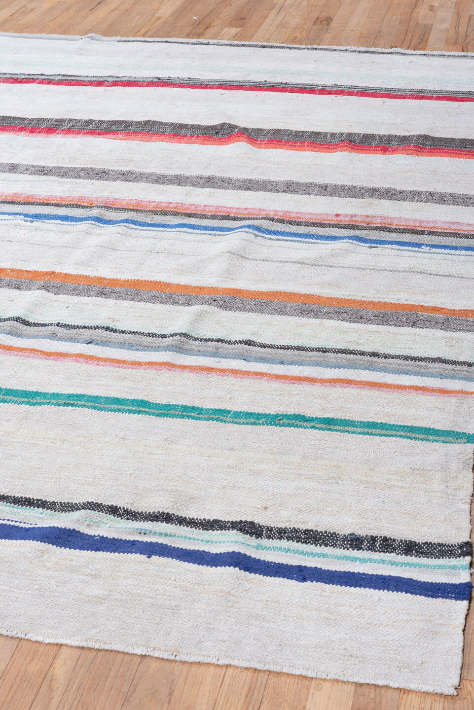 6' x 8' one-of-a-kind handmade vintage Rag Rug medium size rug. Color palette: ivory, charcoal, crimson, orange, cobalt