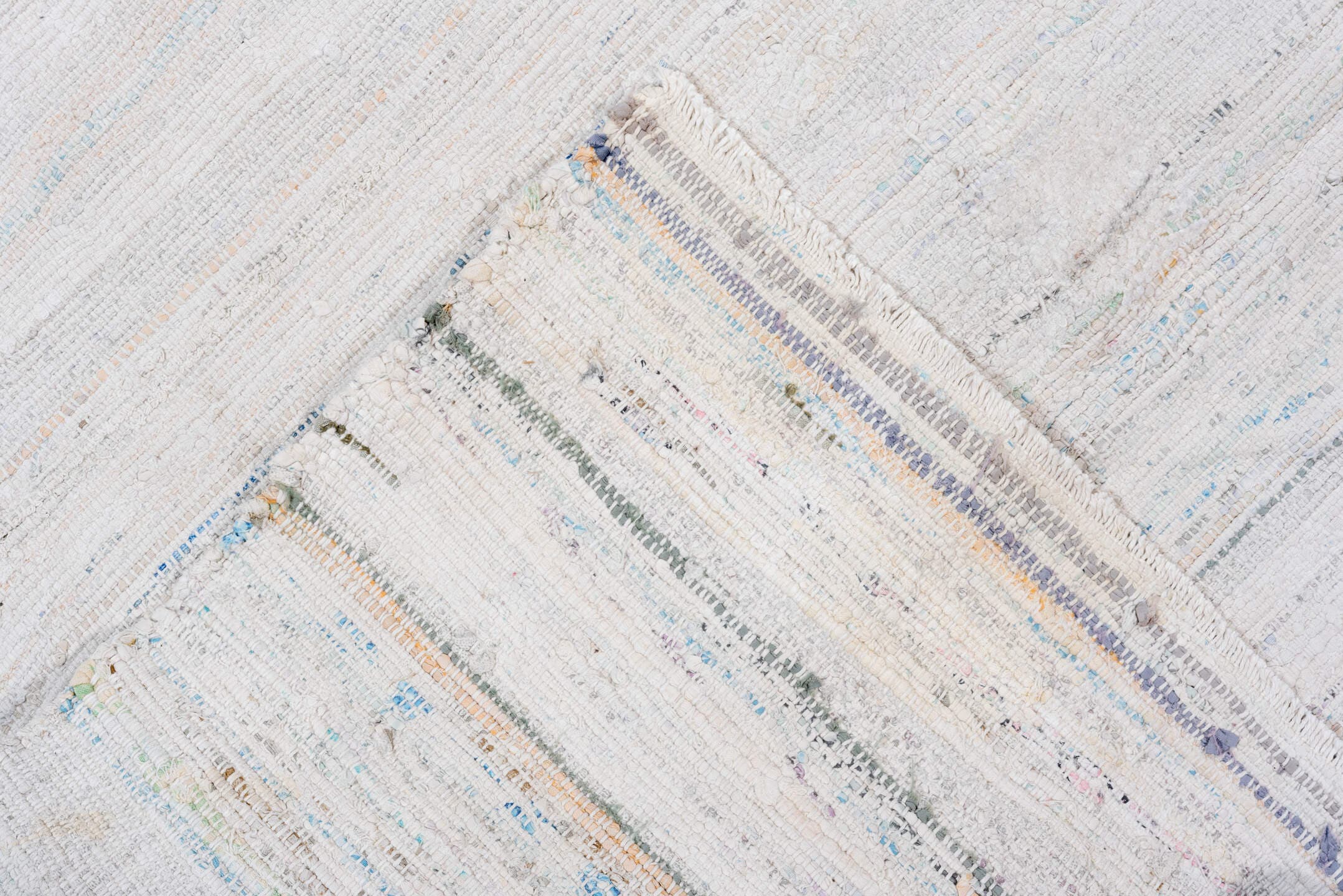7' x 8' one-of-a-kind handmade vintage Rag Rug rug. Color palette: ivory, pale blue, aqua, light gray, blush, cobalt