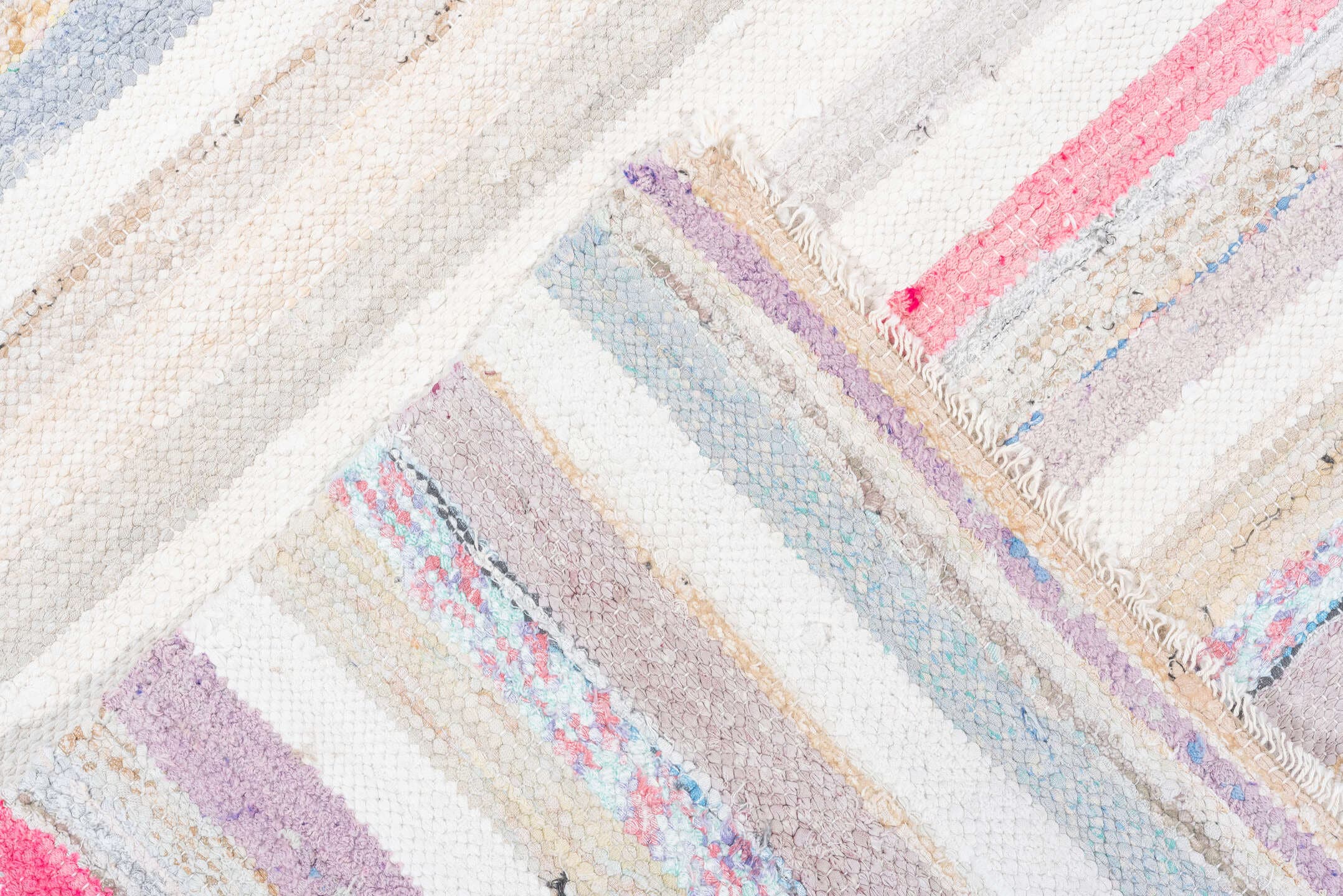7' x 10' one-of-a-kind handmade vintage Rag Rug large size rug. Color palette: ivory, pale blue, beige, charcoal, pink