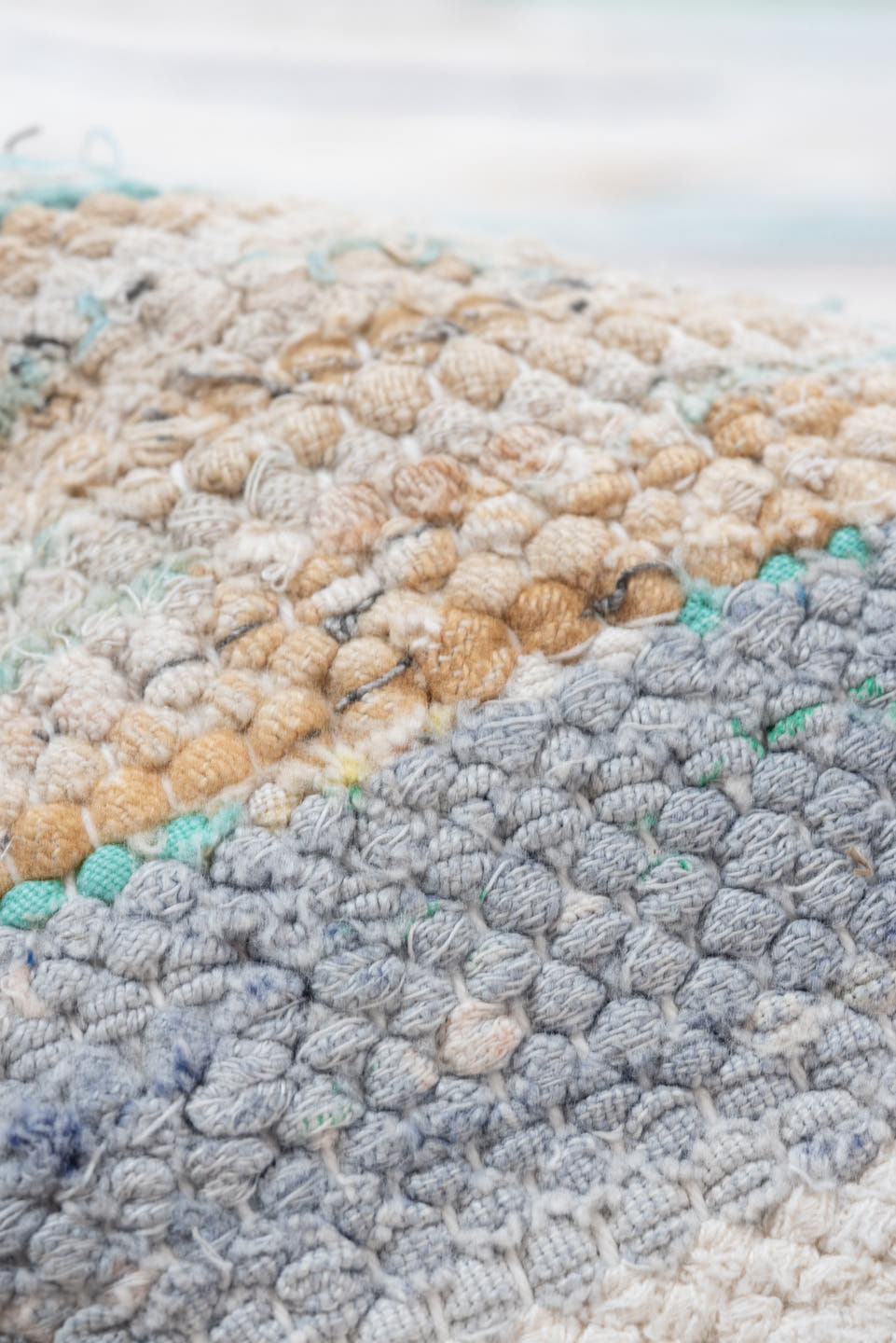 7' x 10' one-of-a-kind handmade vintage Rag Rug large size rug. Color palette: ivory, pale blue, beige, charcoal, pink