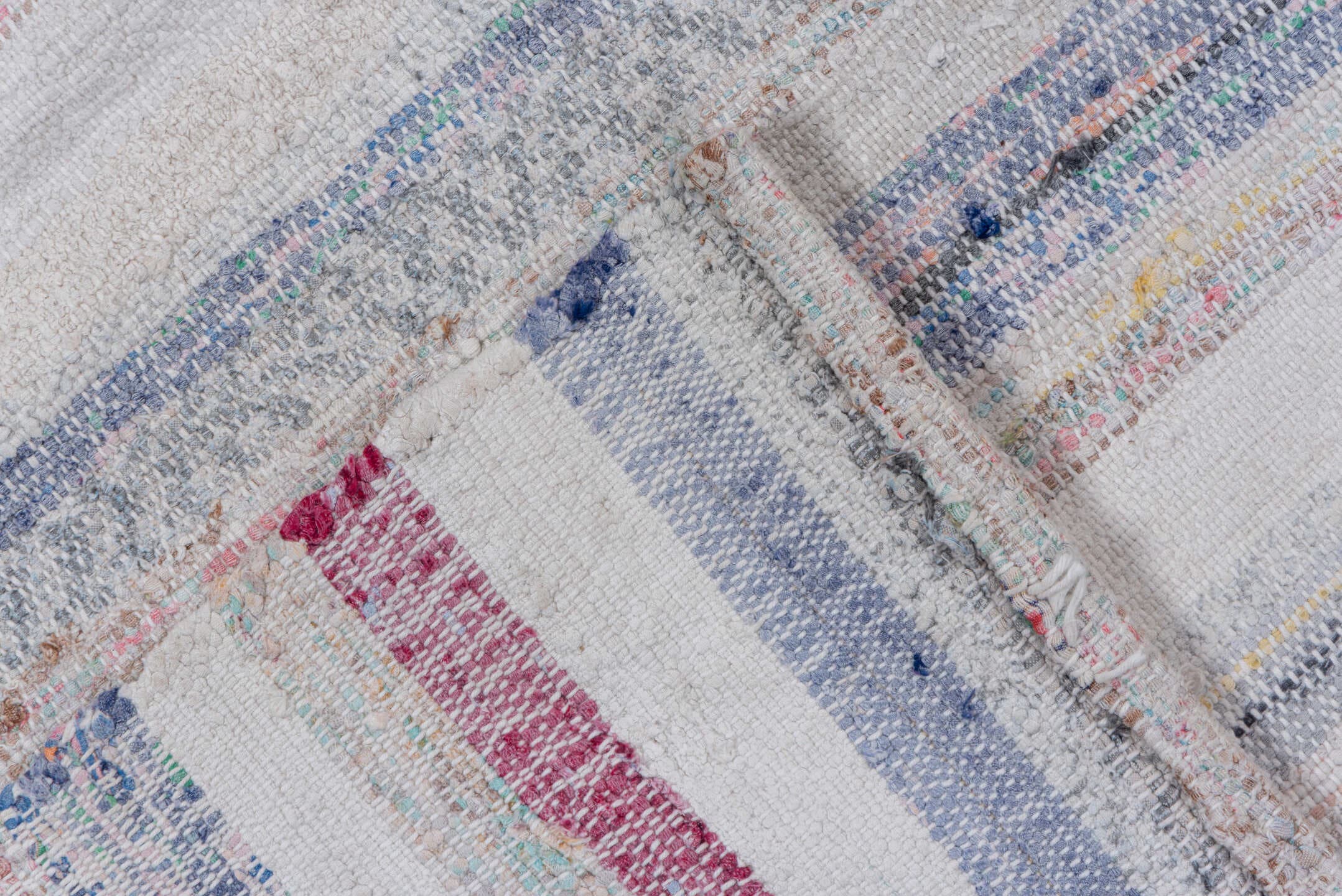 7' x 8' one-of-a-kind handmade antique Rag Rug rug. Color palette: ivory, rose, pale blue, peach, gray, tan, pink, red