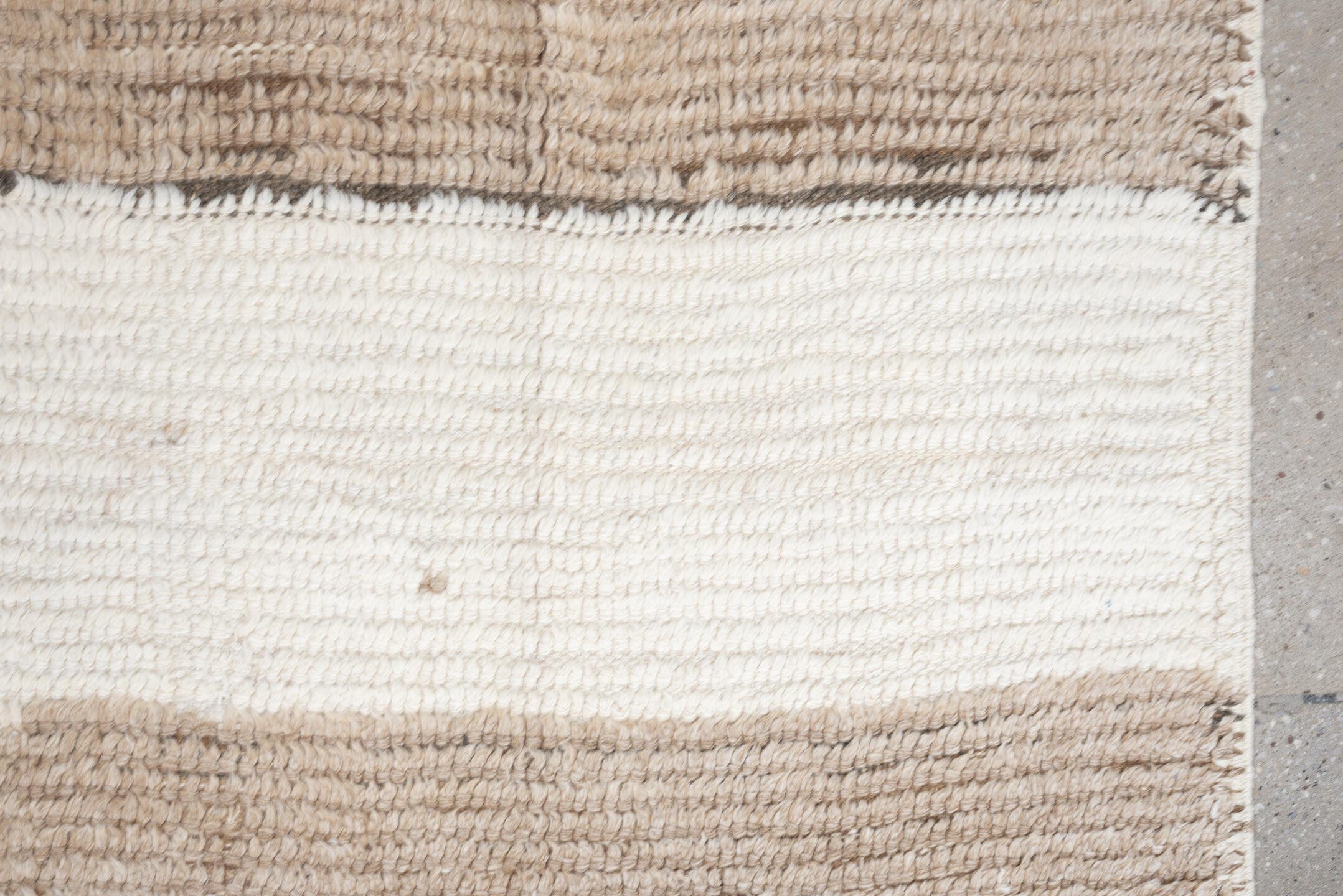 5' x 7' one-of-a-kind handmade antique Moroccan rug. Color palette: taupe, ivory, cream, greige, stone, beige, gray