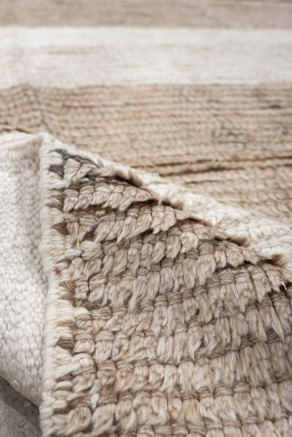 5' x 7' one-of-a-kind handmade antique Moroccan rug. Color palette: taupe, ivory, cream, greige, stone, beige, gray