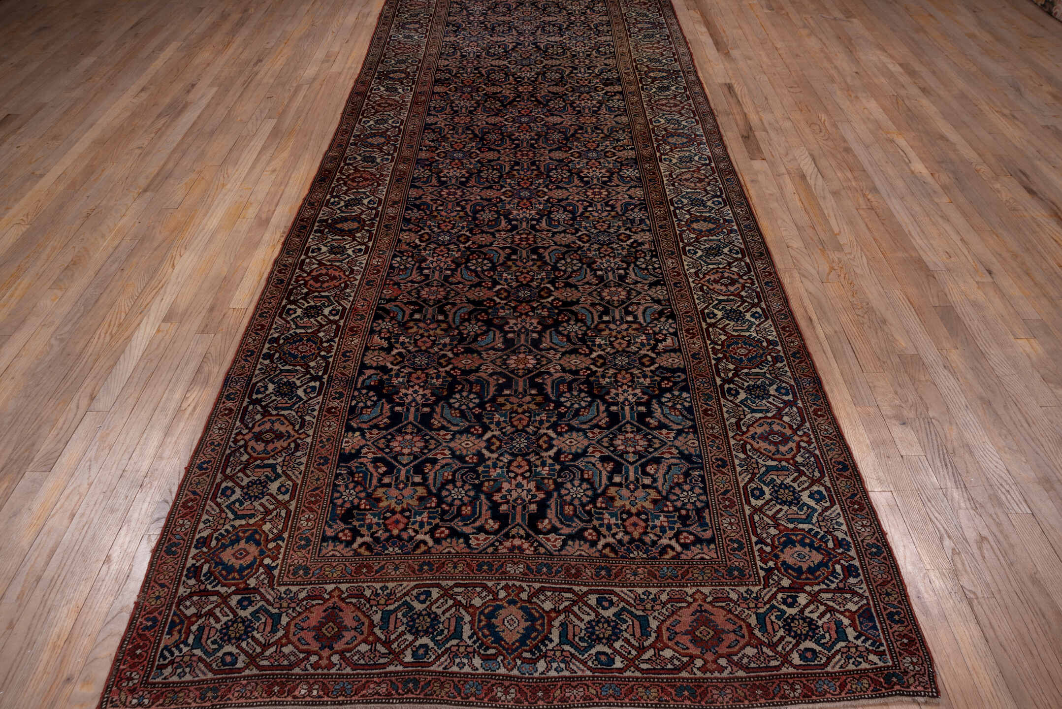 5' x 14' one-of-a-kind handmade vintage Malayer rug. Color palette: black, blue, brown, charcoal, gray