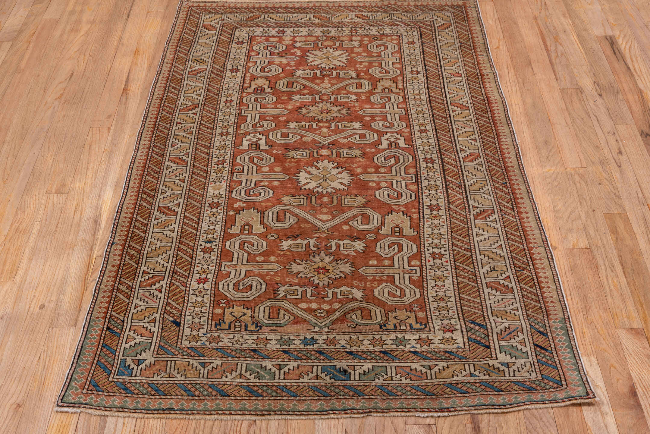 3' x 5' one-of-a-kind handmade antique Shirvan small size rug. Color palette: rust, ivory, camel, taupe, brown, blue, sage