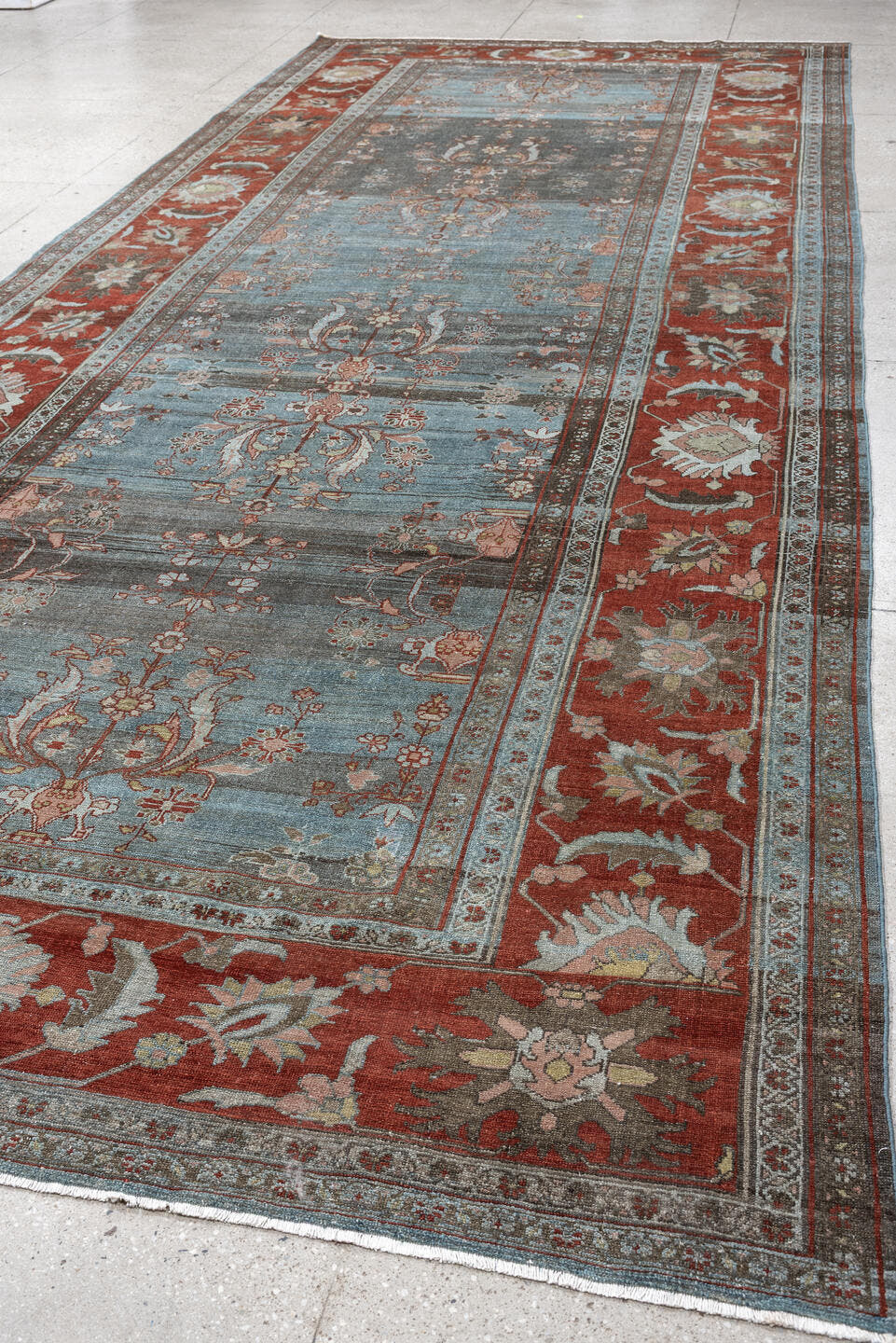 7' x 16' one-of-a-kind handmade antique Lilian rug. Color palette: blue, terracotta, ivory, slate, rose, taupe, charcoal