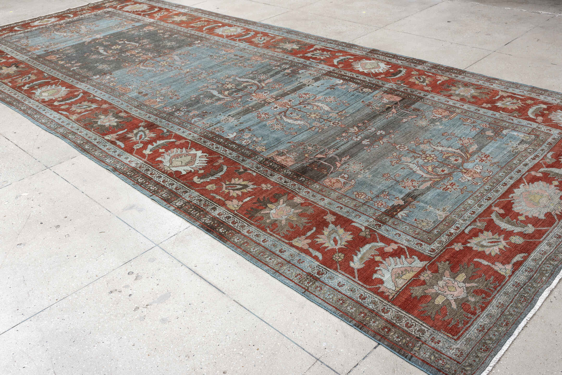 7' x 16' one-of-a-kind handmade antique Lilian rug. Color palette: blue, terracotta, ivory, slate, rose, taupe, charcoal