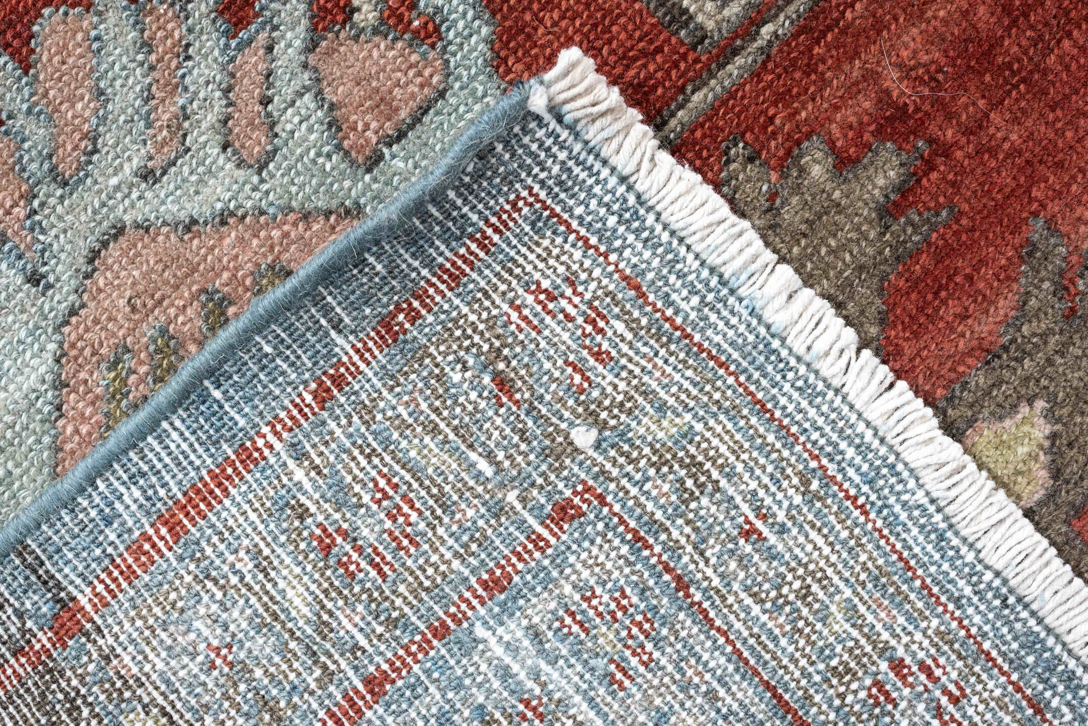 7' x 16' one-of-a-kind handmade antique Lilian rug. Color palette: blue, terracotta, ivory, slate, rose, taupe, charcoal
