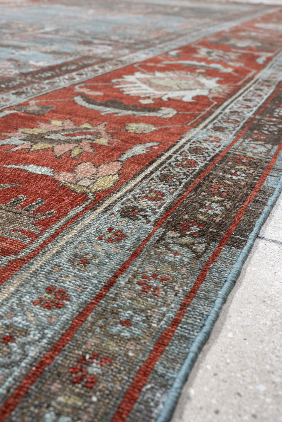 7' x 16' one-of-a-kind handmade antique Lilian rug. Color palette: blue, terracotta, ivory, slate, rose, taupe, charcoal