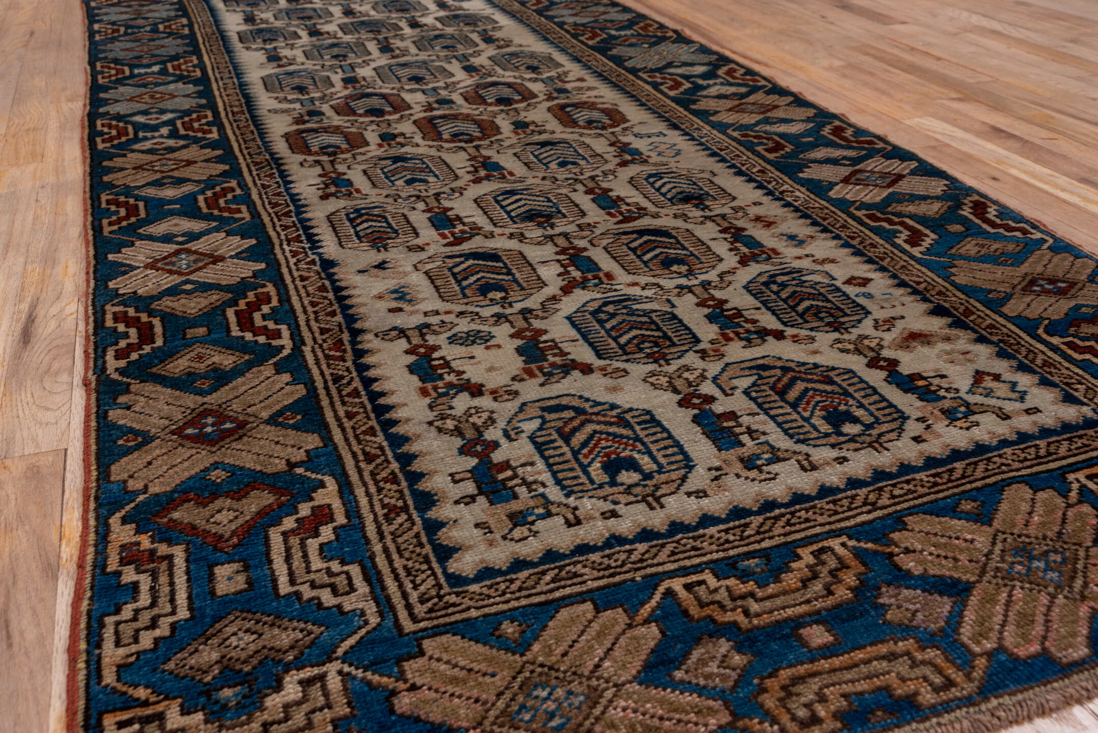 3' x 9' one-of-a-kind handmade vintage NW Persian runner rug. Color palette: black, blue, brown, charcoal, gray