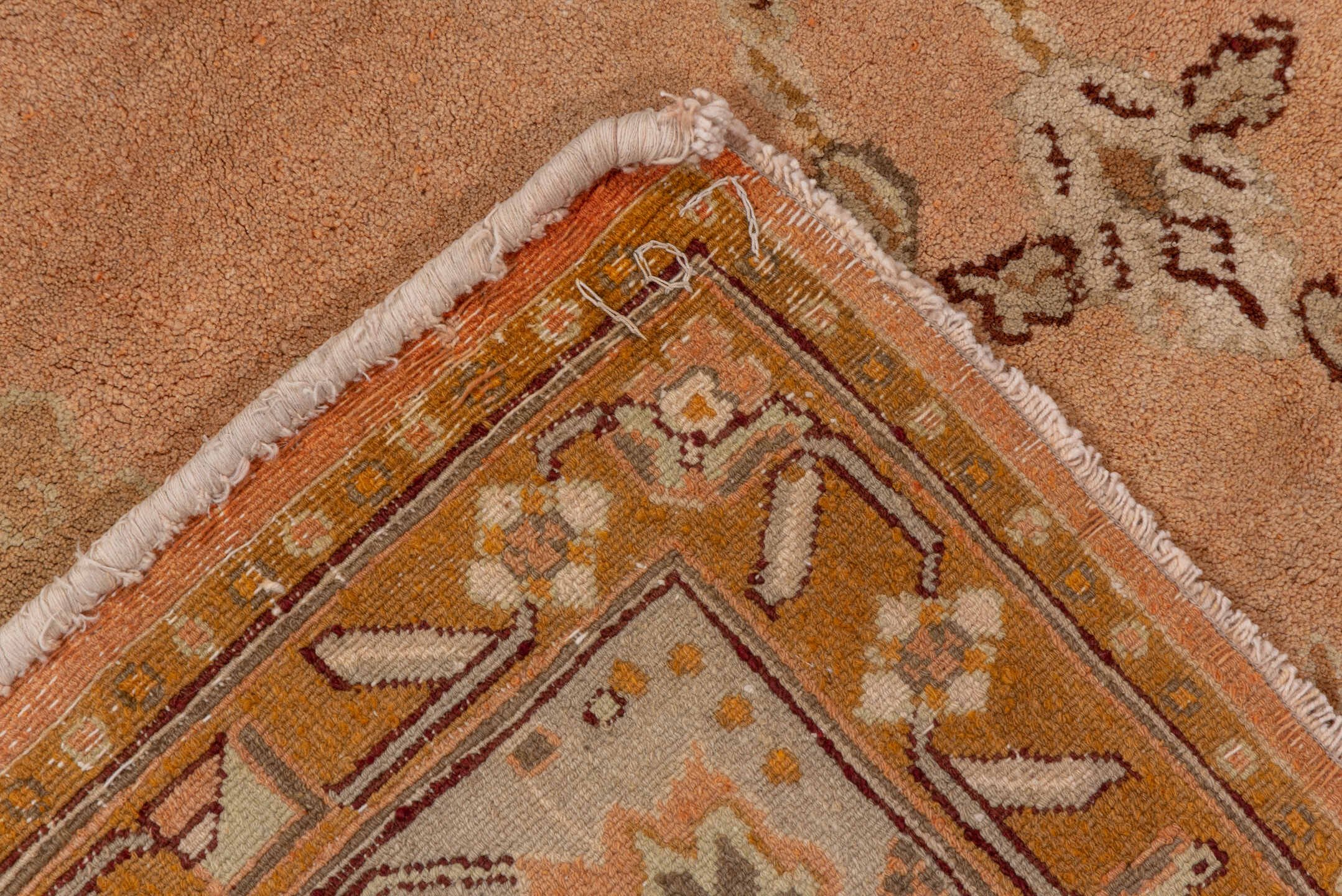 5' x 10' one-of-a-kind handmade antique Agra medium size rug. Color palette: peach, camel, ivory, taupe, gold, olive, brown