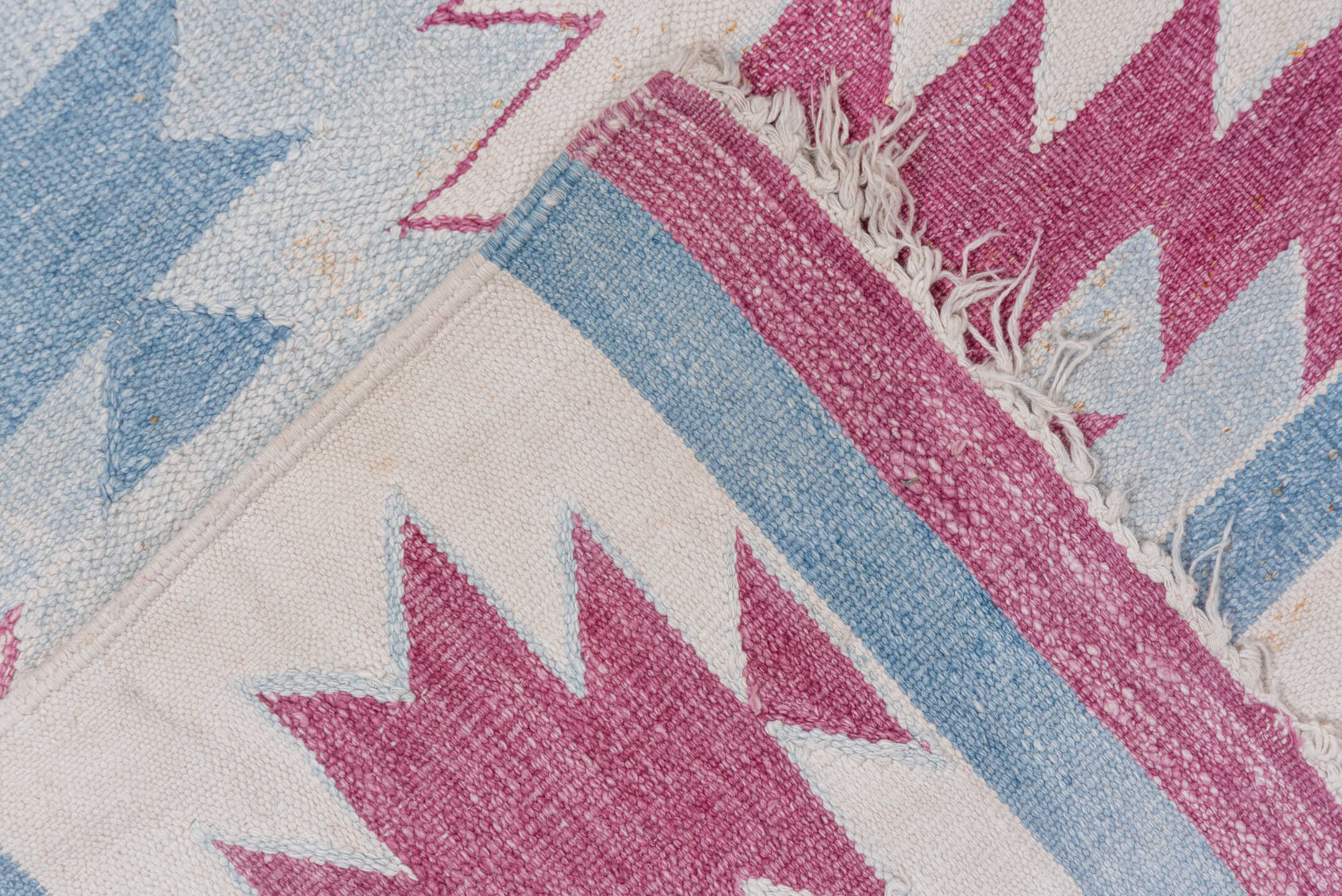 5' x 7' one-of-a-kind handmade antique Dhurrie rug. Color palette: ivory, sky blue, rose, dusty pink, light blue, pink, red