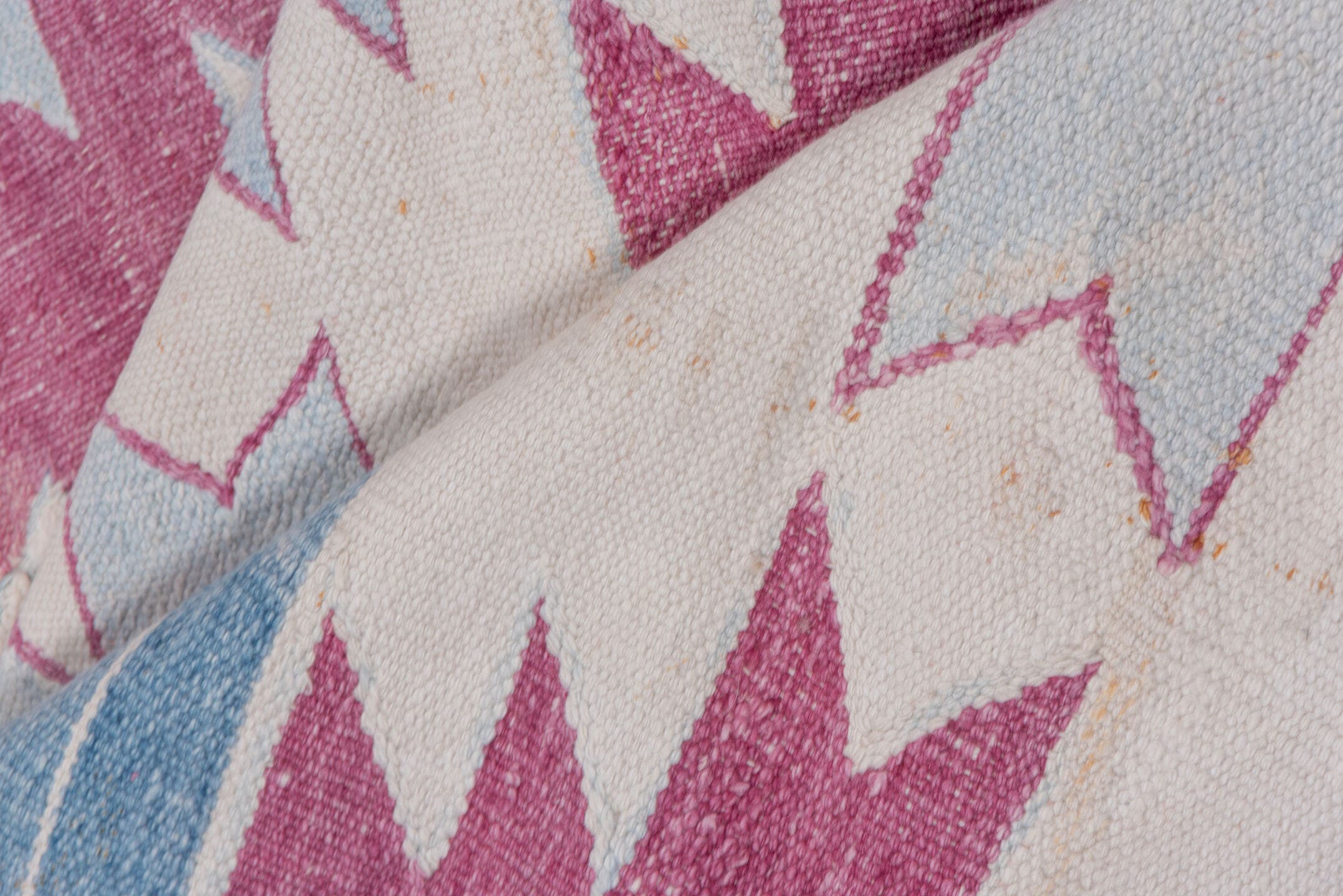 5' x 7' one-of-a-kind handmade antique Dhurrie rug. Color palette: ivory, sky blue, rose, dusty pink, light blue, pink, red