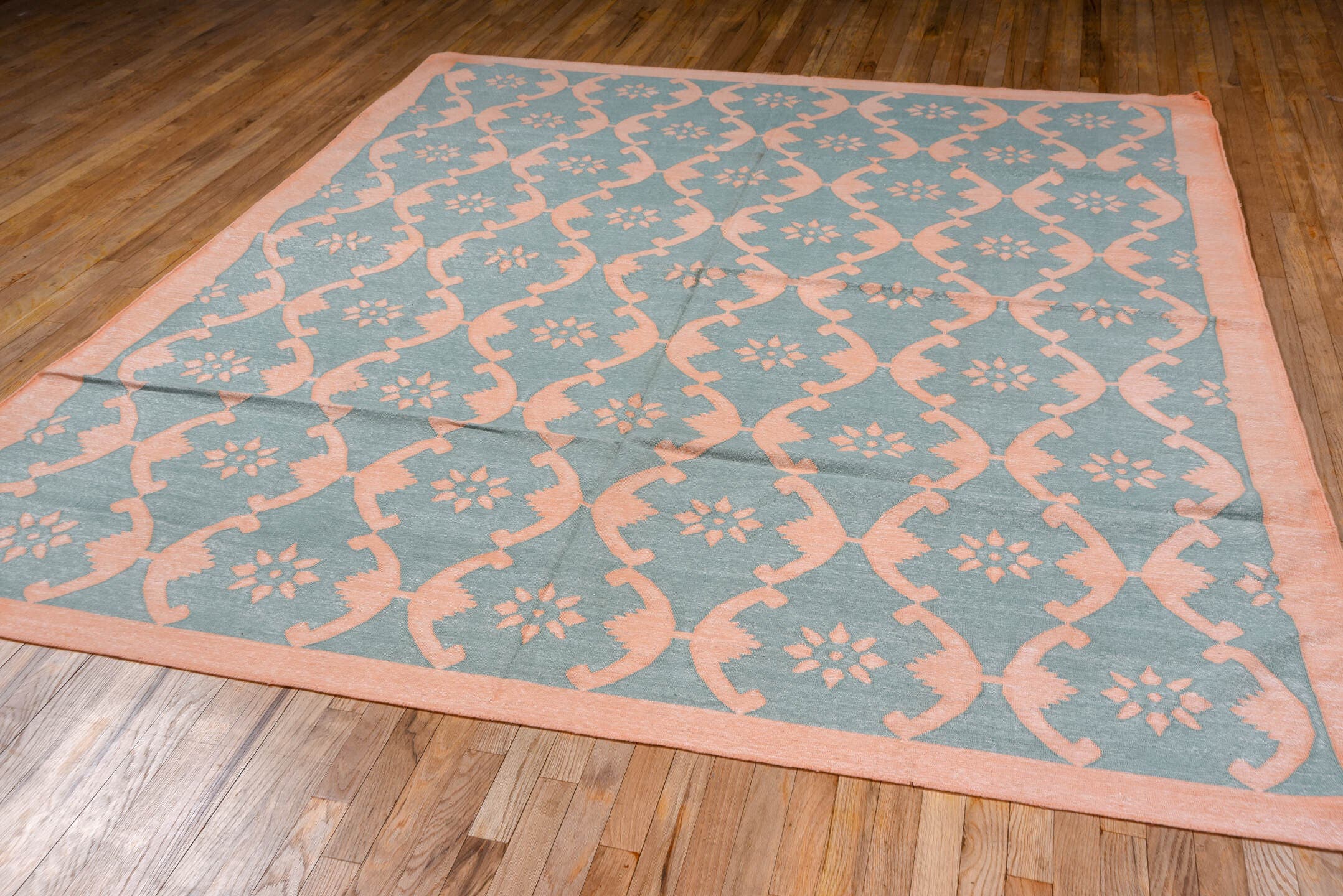 8' x 9' one-of-a-kind handmade vintage Dhurrie rug. Color palette: aqua, peach, ivory, teal, terracotta, pink