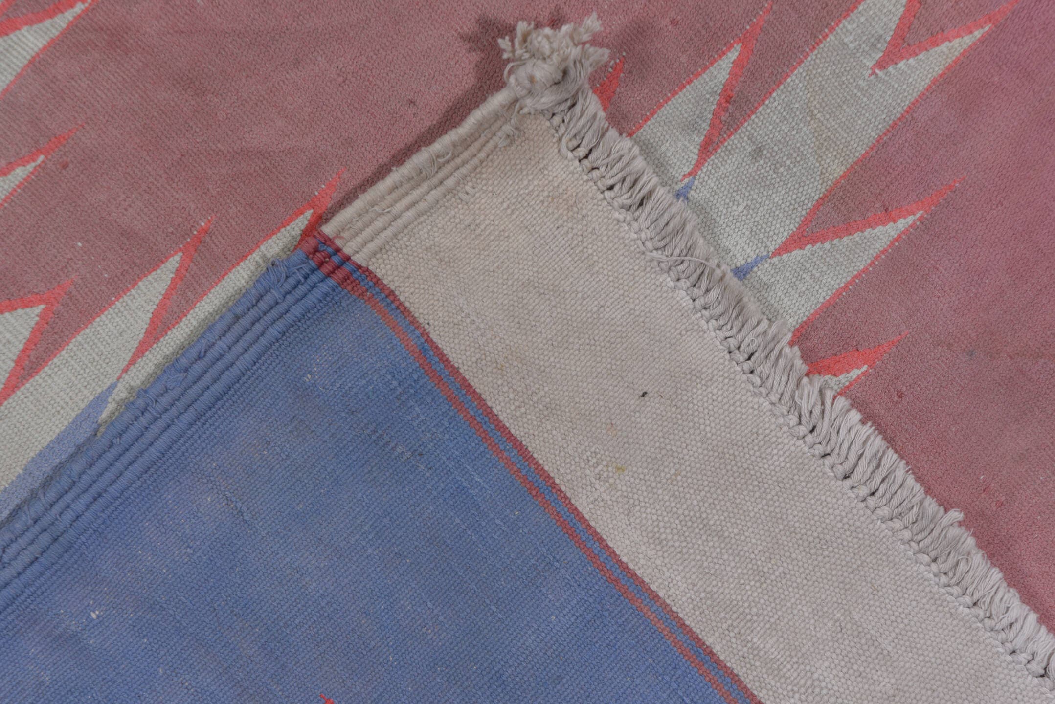 9' x 16' one-of-a-kind handmade antique Dhurrie rug. Color palette: dusty rose, ivory, sky blue, coral, slate blue, pink