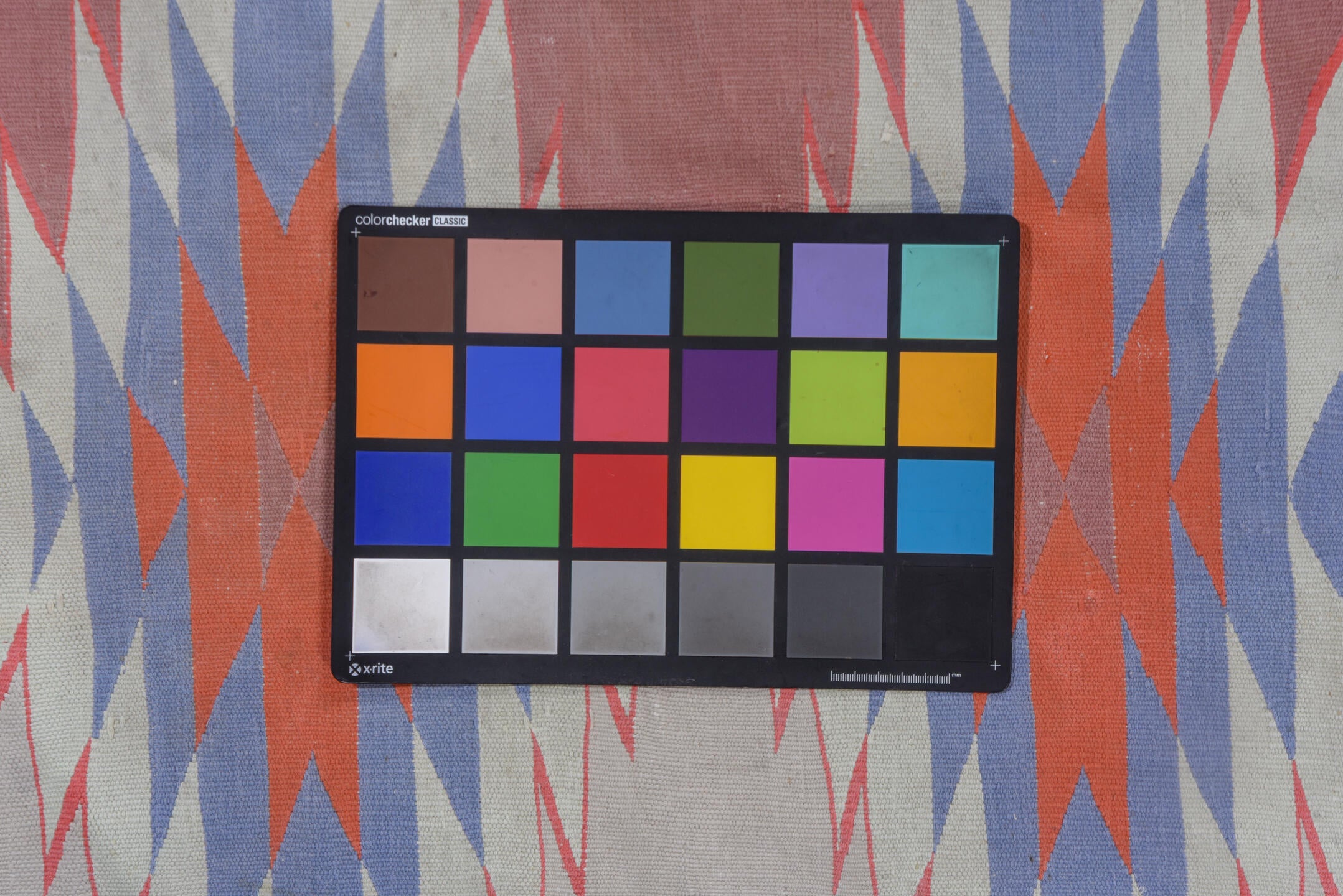 9' x 16' one-of-a-kind handmade vintage Dhurrie rug. Color palette: blue, dark gray, gray, light gray, off-white, pink, red