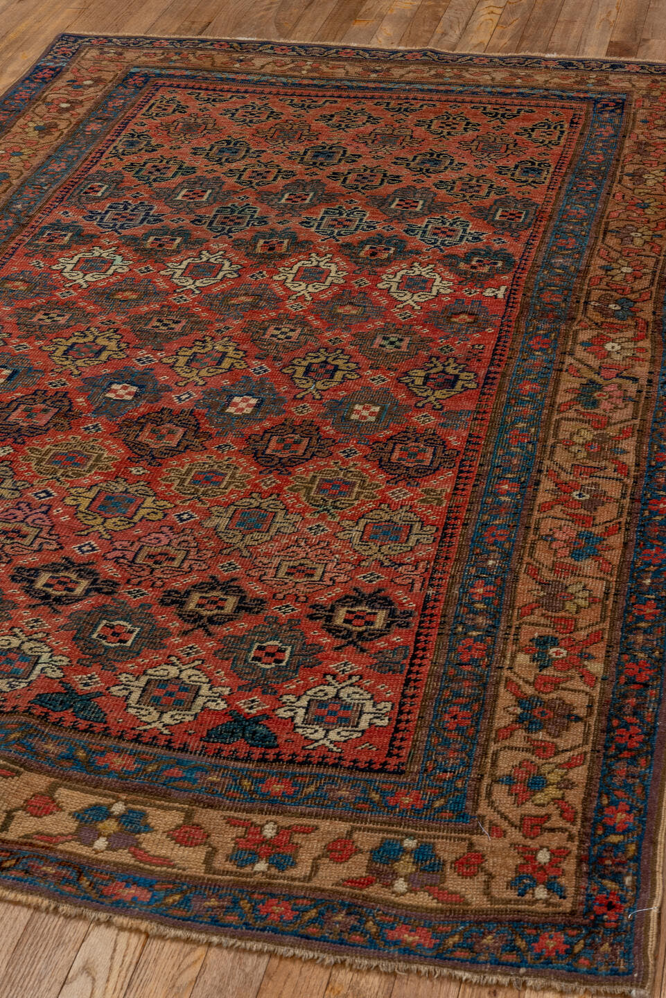 4' x 7' one-of-a-kind handmade vintage Bidjar rug. Color palette: rust, navy, ivory, blue, camel, crimson, charcoal, gold