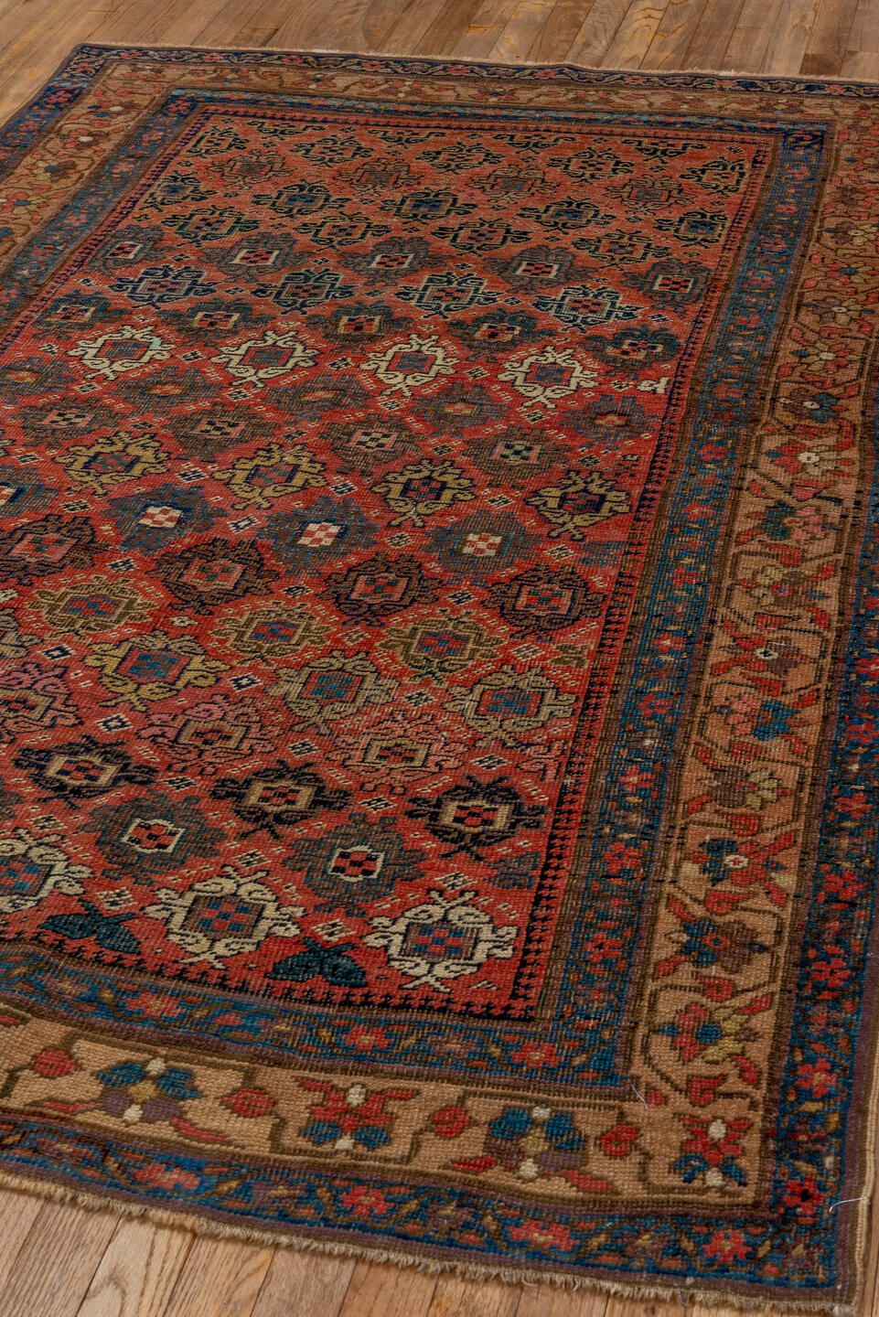 4' x 7' one-of-a-kind handmade vintage Bidjar rug. Color palette: rust, navy, ivory, blue, camel, crimson, charcoal, gold