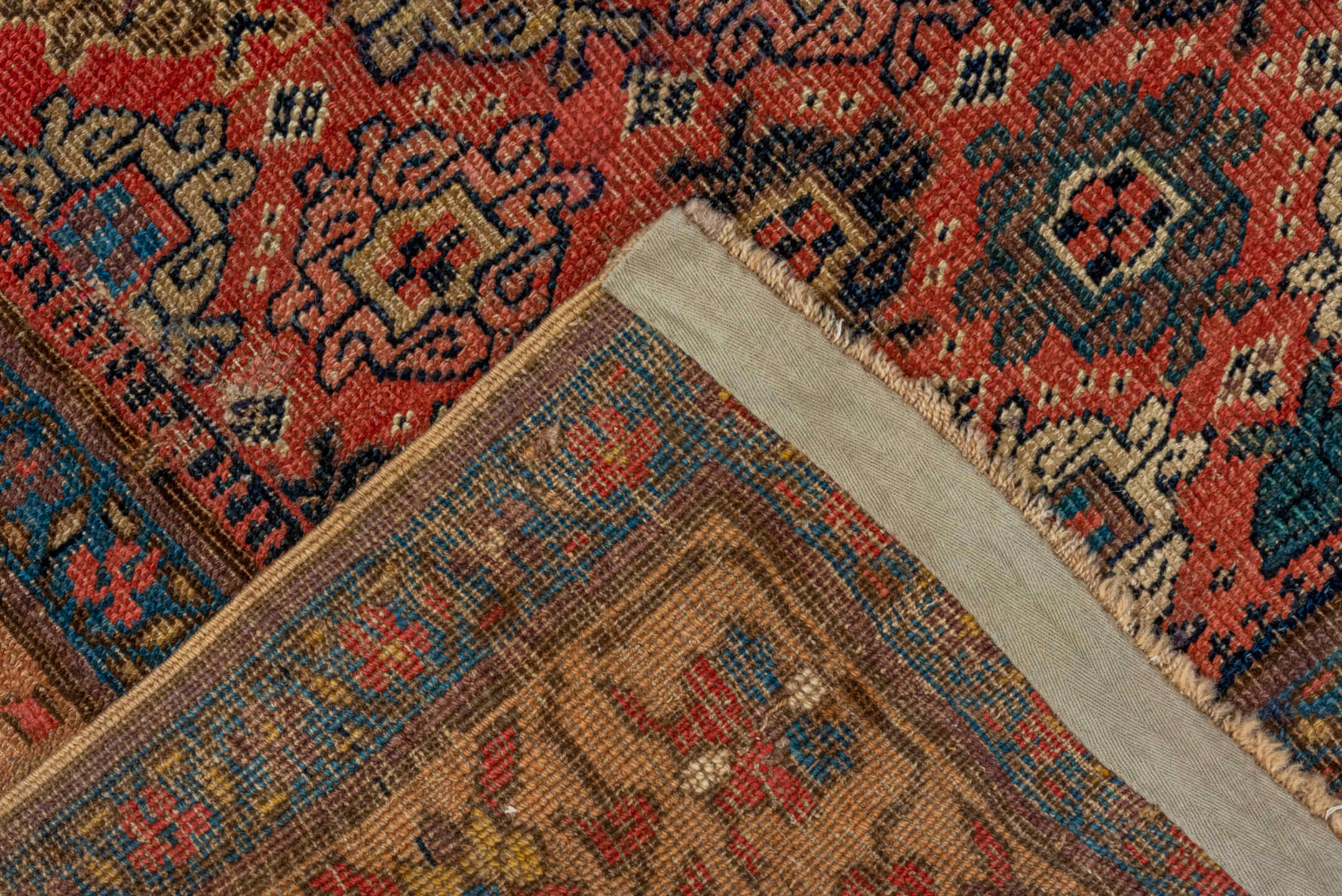4' x 7' one-of-a-kind handmade vintage Bidjar rug. Color palette: rust, navy, ivory, blue, camel, crimson, charcoal, gold