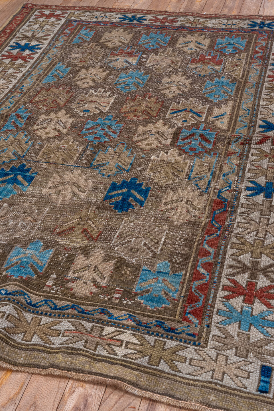3' x 4' one-of-a-kind handmade vintage Caucasian small size rug. Color palette: taupe, ivory, sky_blue, rust, camel, navy