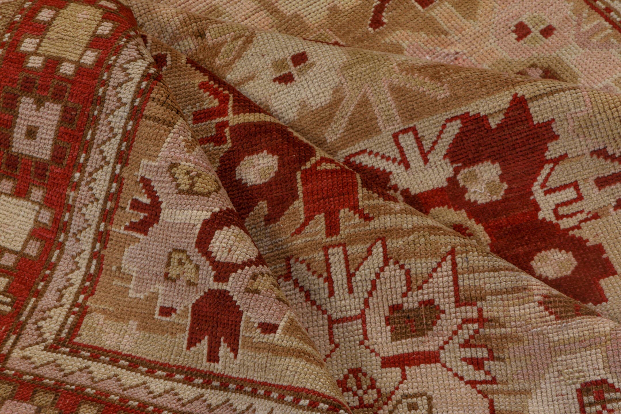 4' x 6' one-of-a-kind handmade antique Caucasian small size rug. Color palette: ivory, rust, beige, camel, taupe, sienna