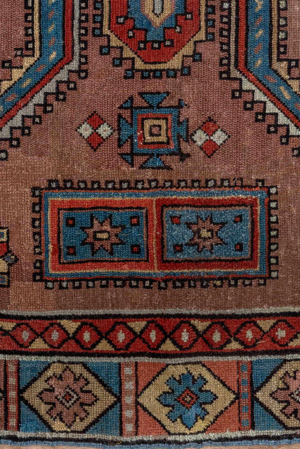 3' x 5' one-of-a-kind handmade antique Caucasian small size rug. Color palette: rose, ivory, sky_blue, rust, slate_blue