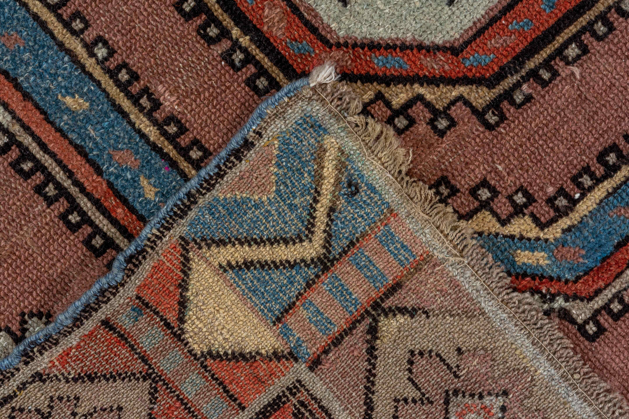3' x 5' one-of-a-kind handmade antique Caucasian small size rug. Color palette: rose, ivory, sky_blue, rust, slate_blue