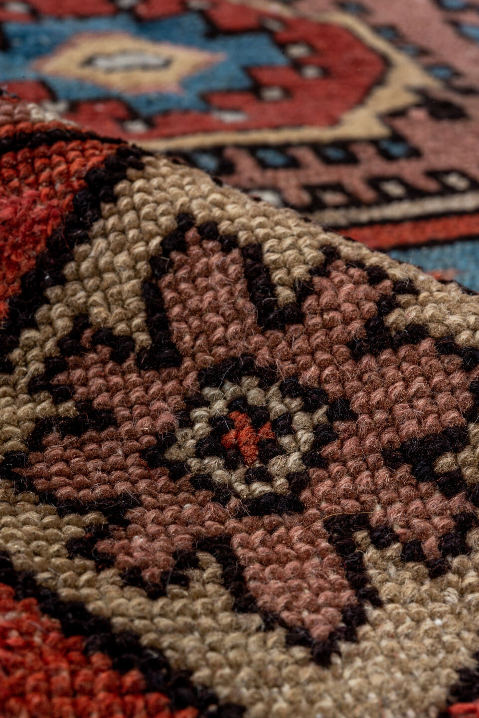 3' x 5' one-of-a-kind handmade antique Caucasian small size rug. Color palette: rose, ivory, sky_blue, rust, slate_blue