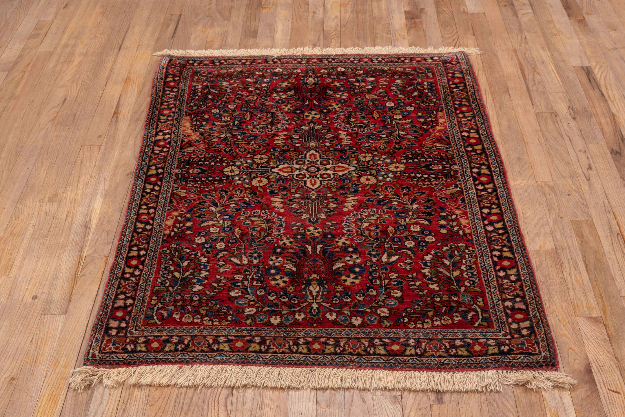 3' x 4' one-of-a-kind handmade vintage Sarouk small size rug. Color palette: red, navy, ivory, rust, camel, rose, charcoal
