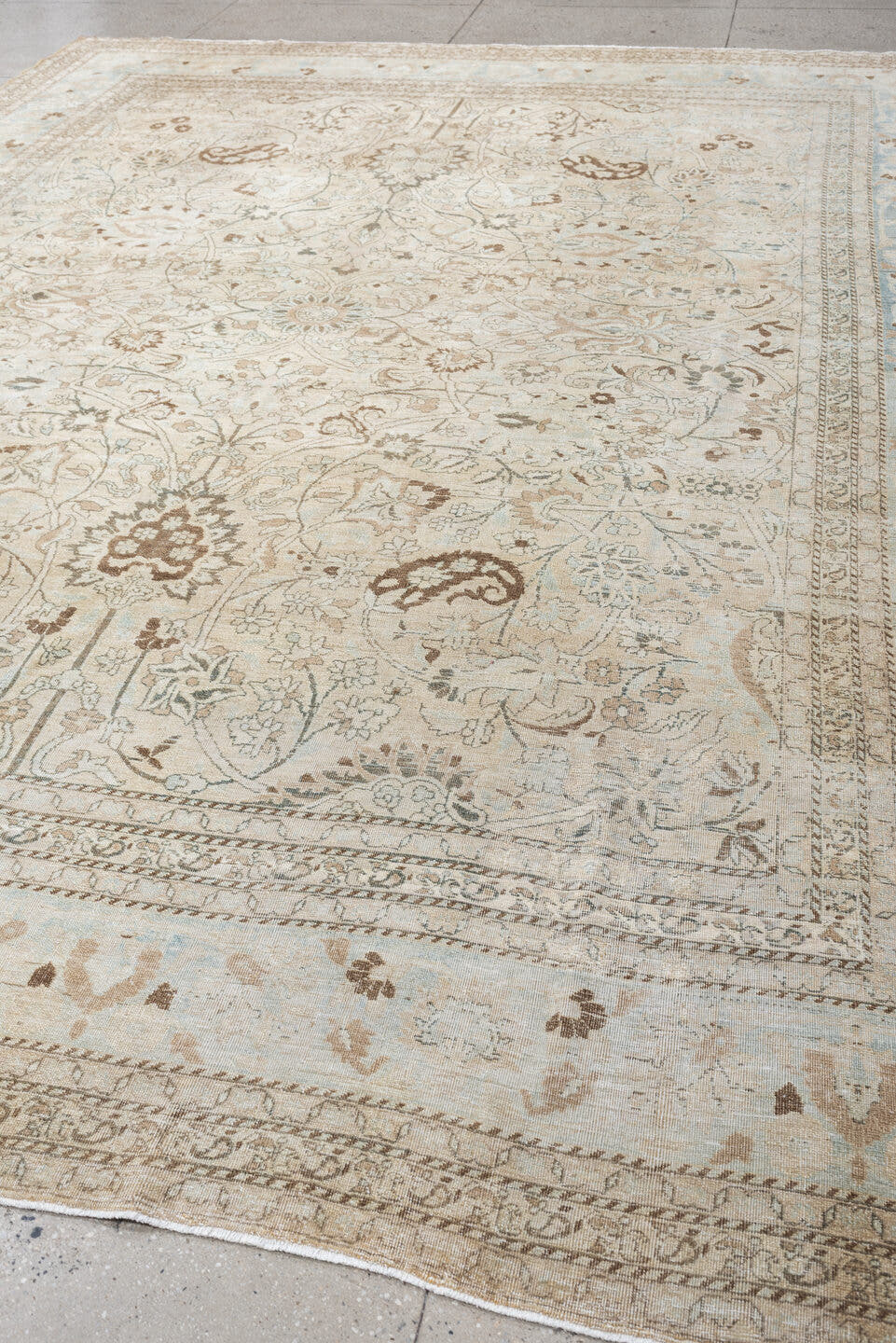 10' x 13' one-of-a-kind handmade antique Meshed large size rug. Color palette: ivory, pale blue, taupe, camel, brown, sage
