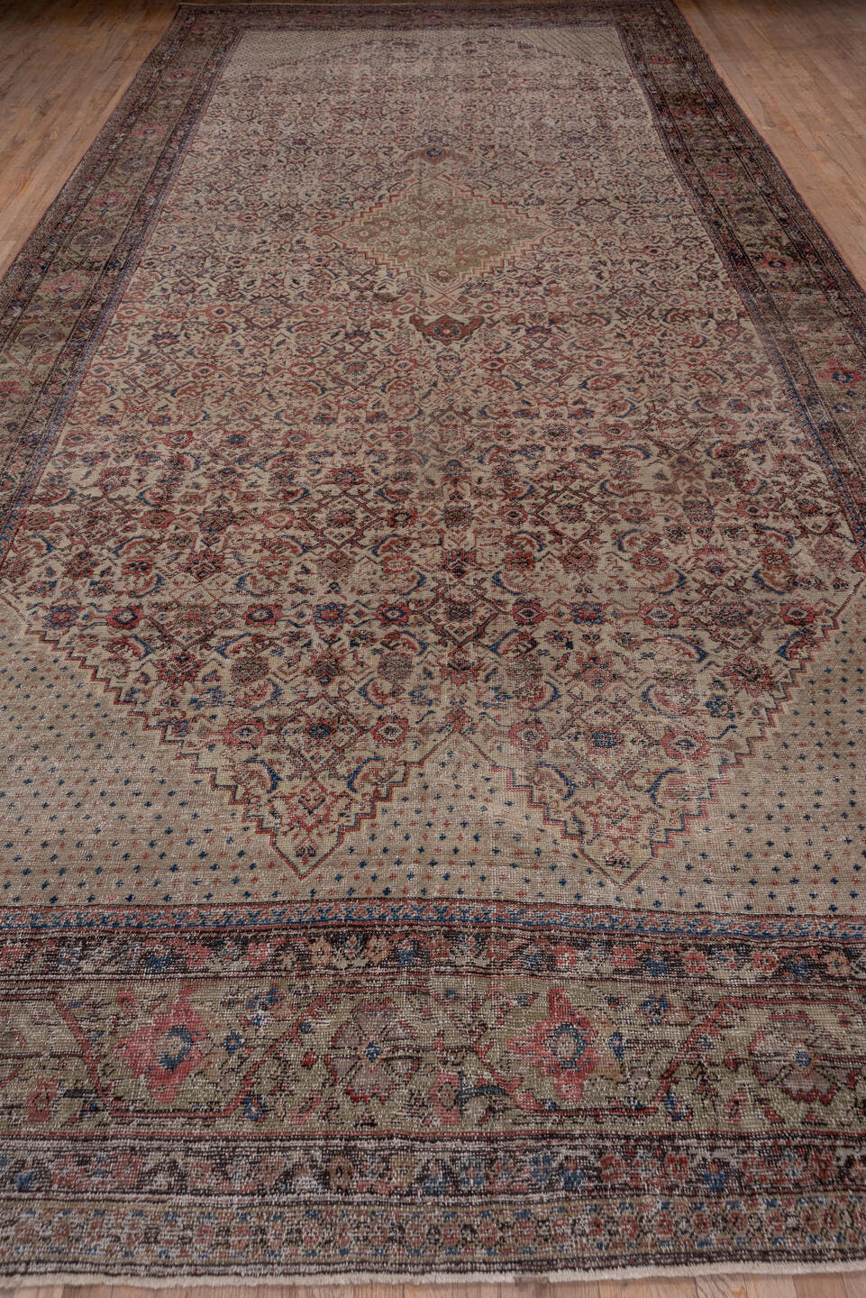 8' x 19' one-of-a-kind handmade antique Farahan rug. Color palette: ivory, taupe, rose, slate, rust, sage, burgundy, beige