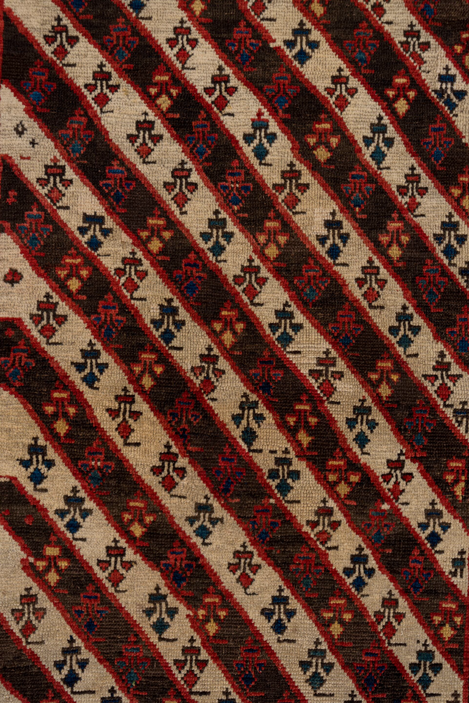 3' x 7' one-of-a-kind handmade vintage Kazak rug. Color palette: ivory, navy, teal, rust, crimson, gold, blue, terracotta