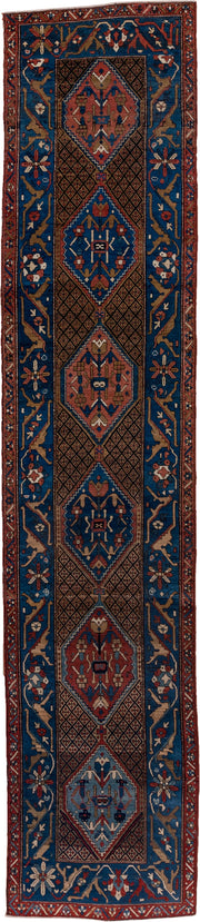 2' x 13' one-of-a-kind handmade antique Sarab runner rug. Color palette: navy, rust, camel, ivory, sky_blue, crimson