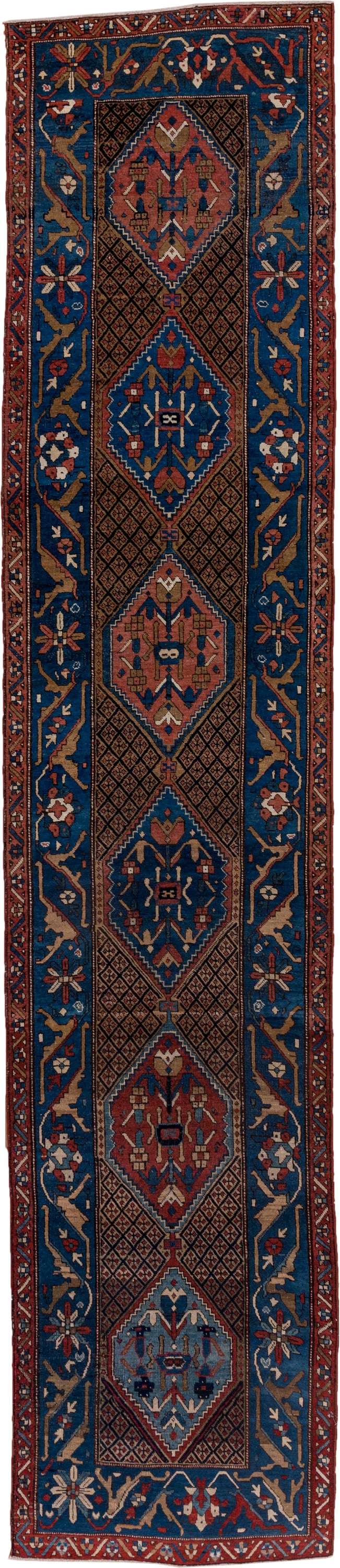 2' x 13' one-of-a-kind handmade antique Sarab runner rug. Color palette: navy, rust, camel, ivory, sky_blue, crimson