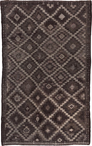 6' x 9' one-of-a-kind handmade vintage Jijim medium size rug. Color palette: charcoal, taupe, brown, ivory, mauve, gray