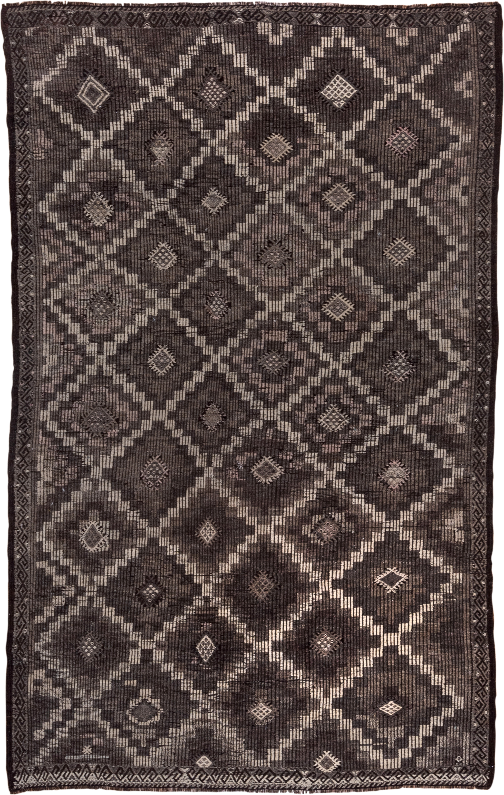 6' x 9' one-of-a-kind handmade vintage Jijim medium size rug. Color palette: charcoal, taupe, brown, ivory, mauve, gray