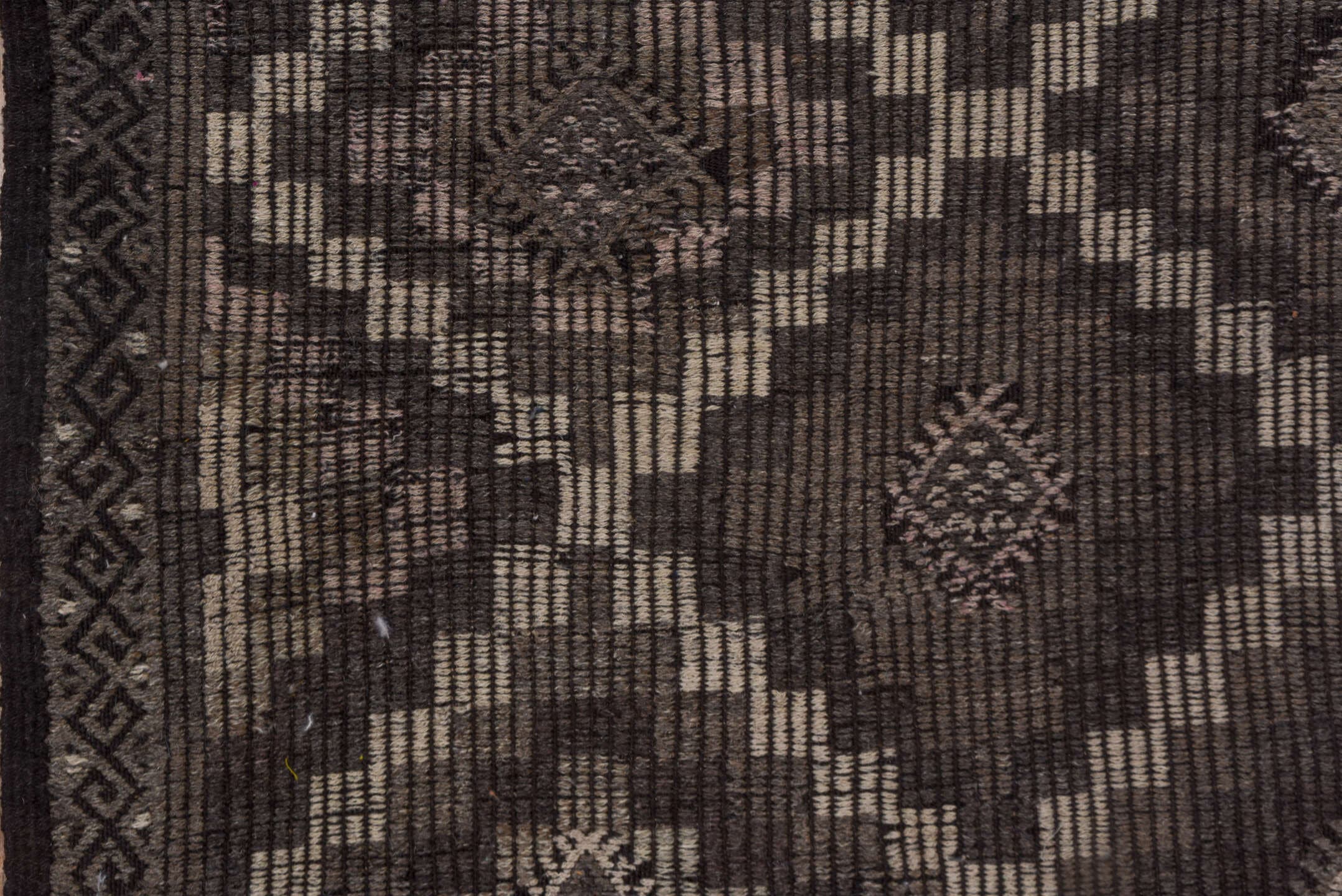 6' x 9' one-of-a-kind handmade vintage Jijim medium size rug. Color palette: charcoal, taupe, brown, ivory, mauve, gray