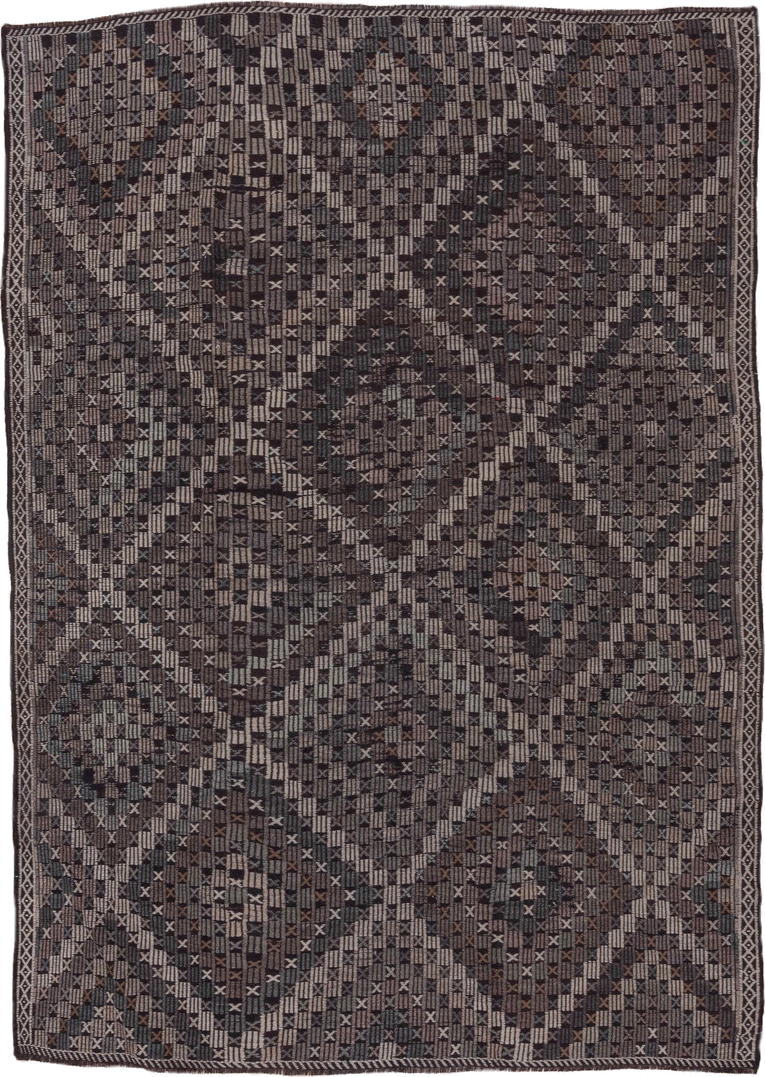 7' x 9' one-of-a-kind handmade vintage Jijim rug. Color palette: charcoal, ivory, slate, taupe, brown, gray, black, beige