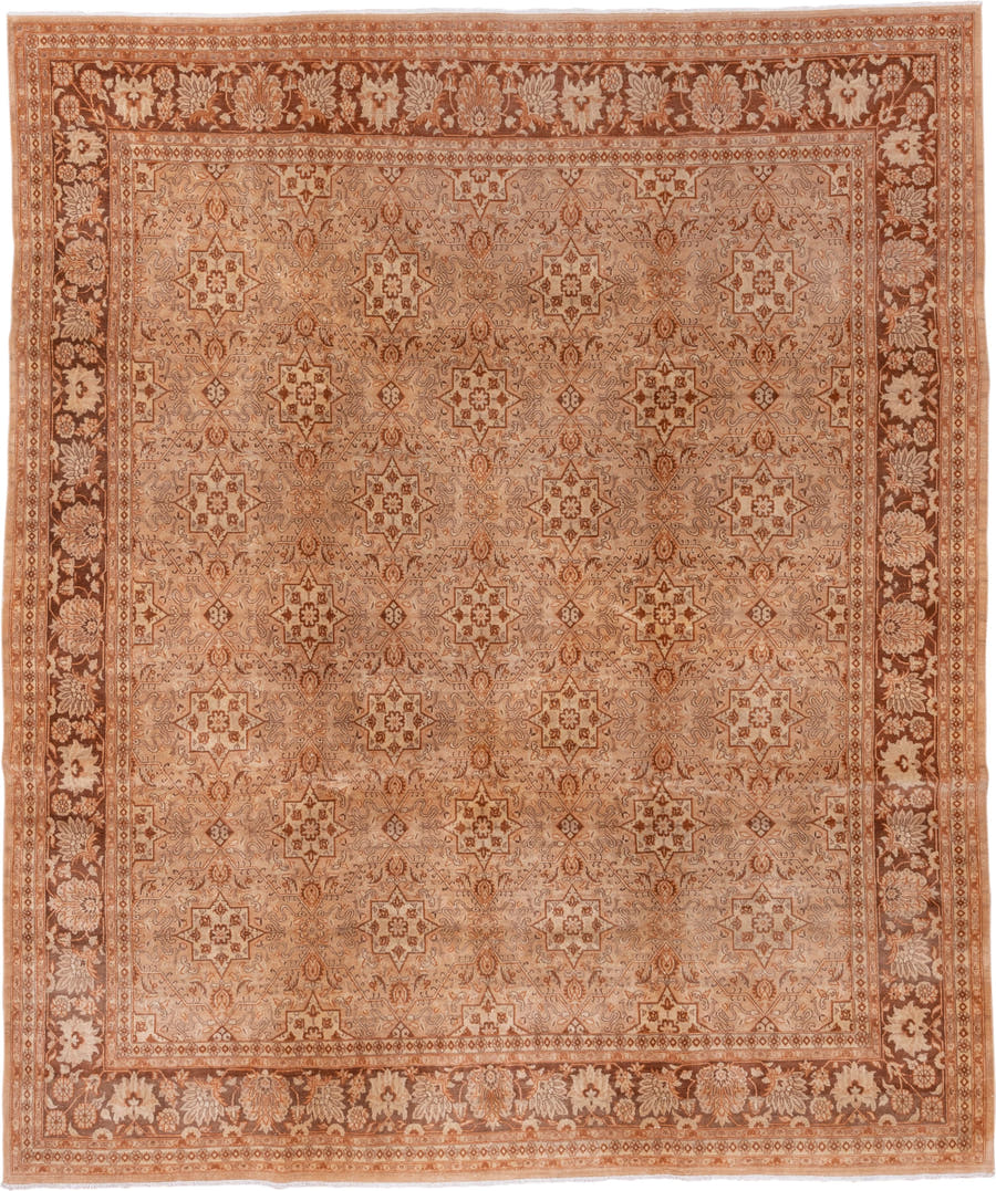 8' x 9' one-of-a-kind handmade vintage Agra rug. Color palette: terra cotta, camel, ivory, rust, taupe, brown, terracotta