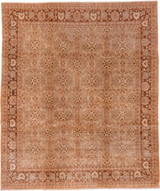 8' x 9' one-of-a-kind handmade vintage Agra rug. Color palette: terra cotta, camel, ivory, rust, taupe, brown, terracotta