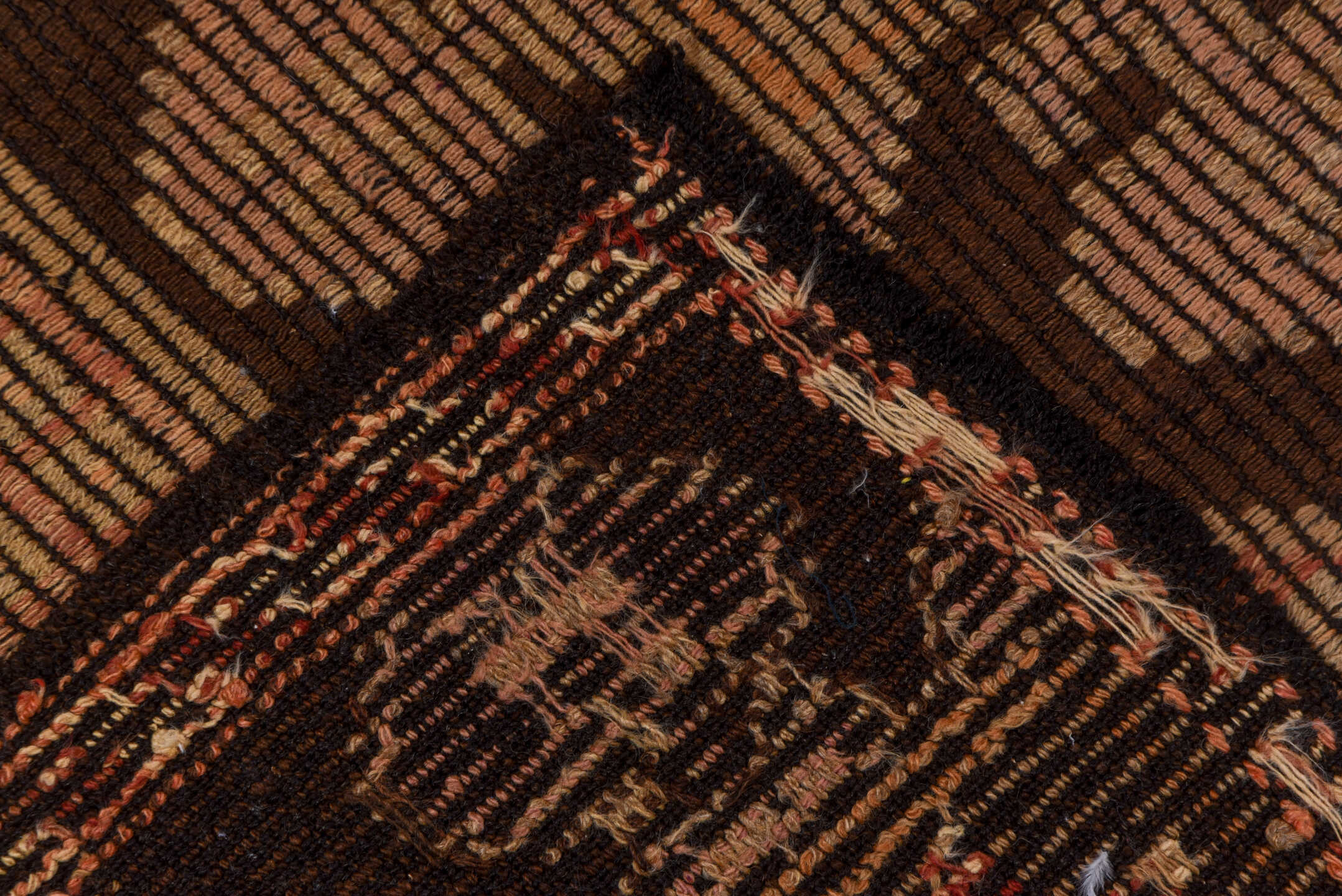6' x 9' one-of-a-kind handmade vintage Jijim medium size rug. Color palette: camel, taupe, dark brown, terra cotta, rose