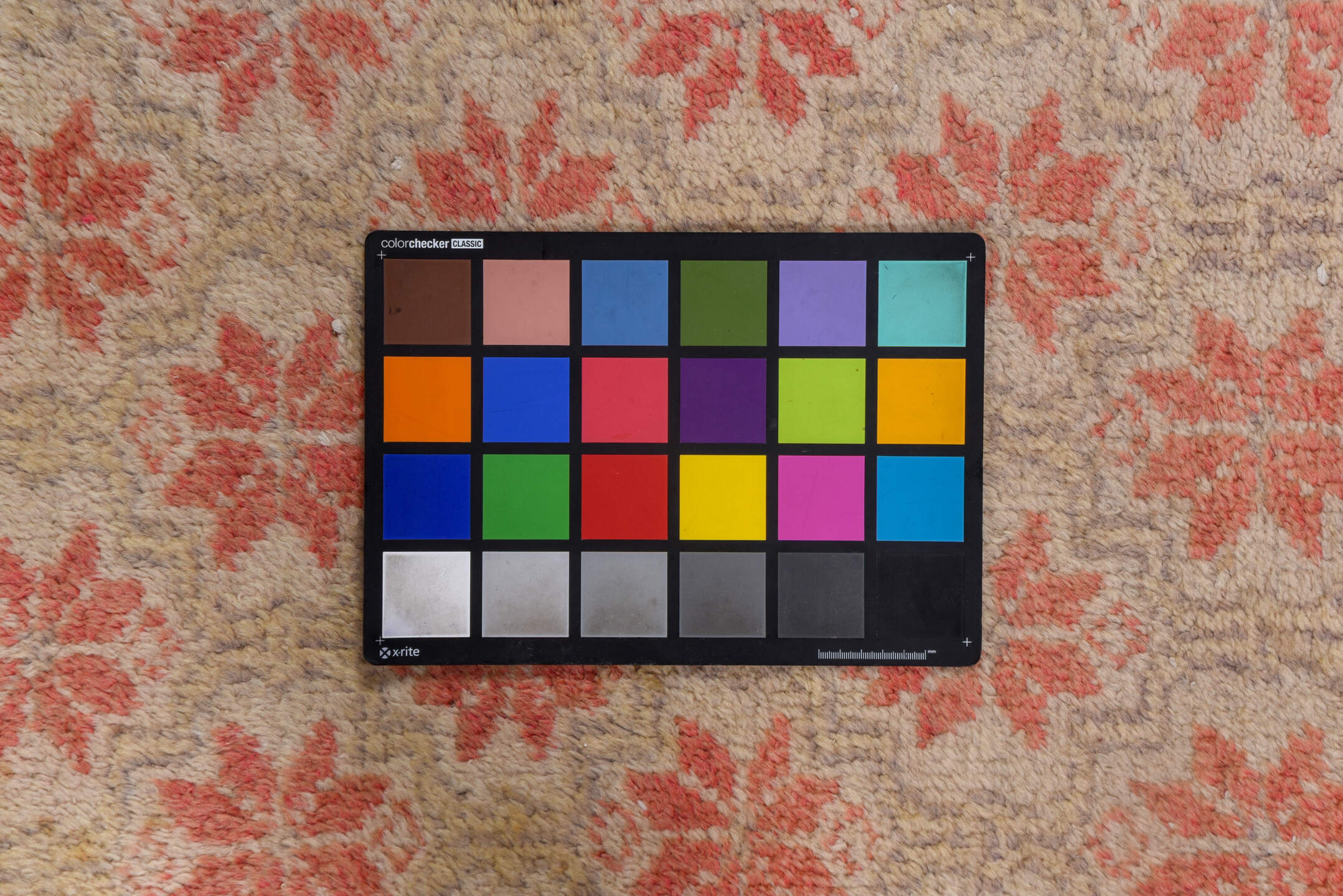 2' x 6' one-of-a-kind handmade vintage Oushak runner rug. Color palette: brown, off-white, orange, pink, red, snow, white