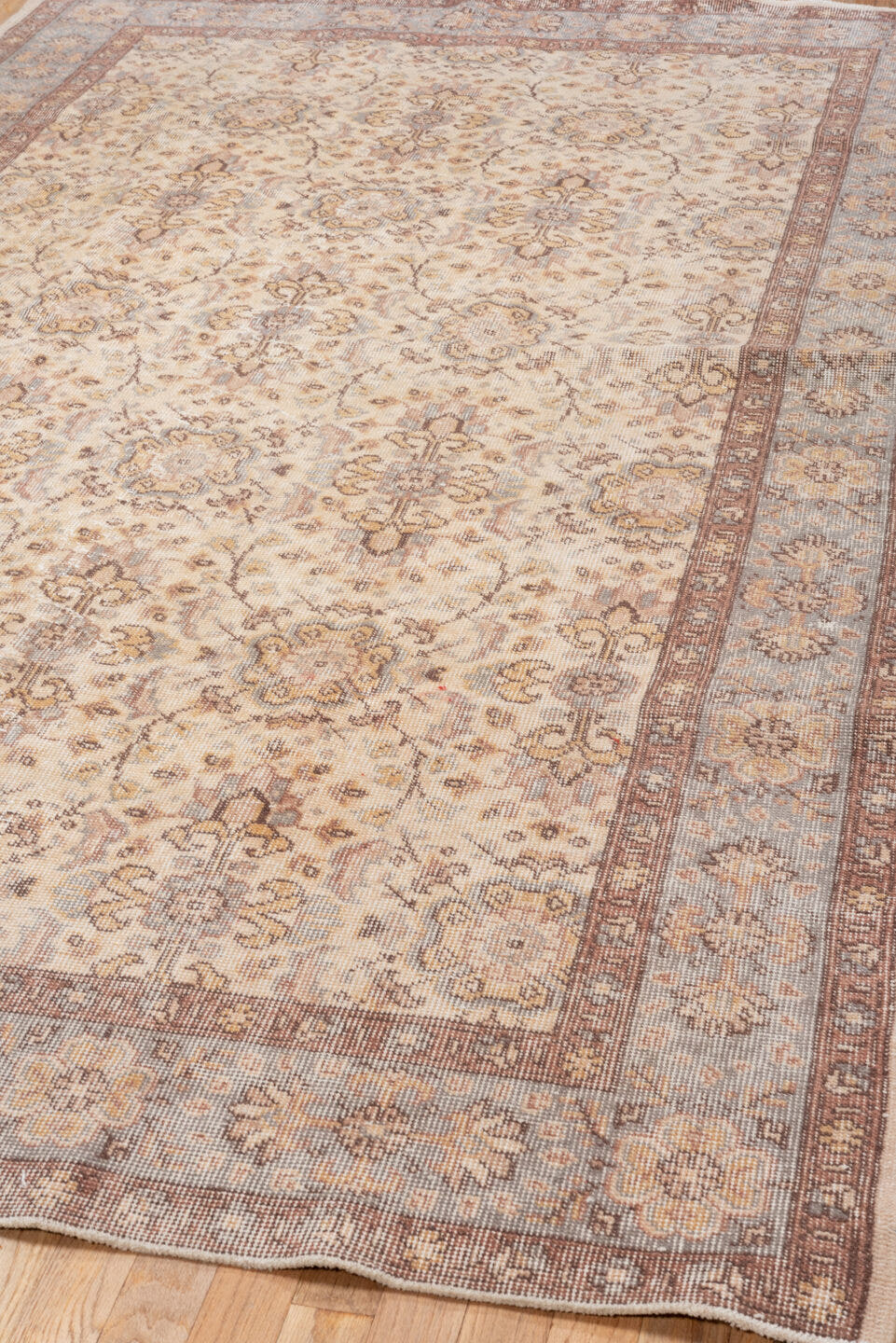 5' x 9' one-of-a-kind handmade vintage Oushak medium size rug. Color palette: ivory, taupe, brown, pale blue, beige, camel