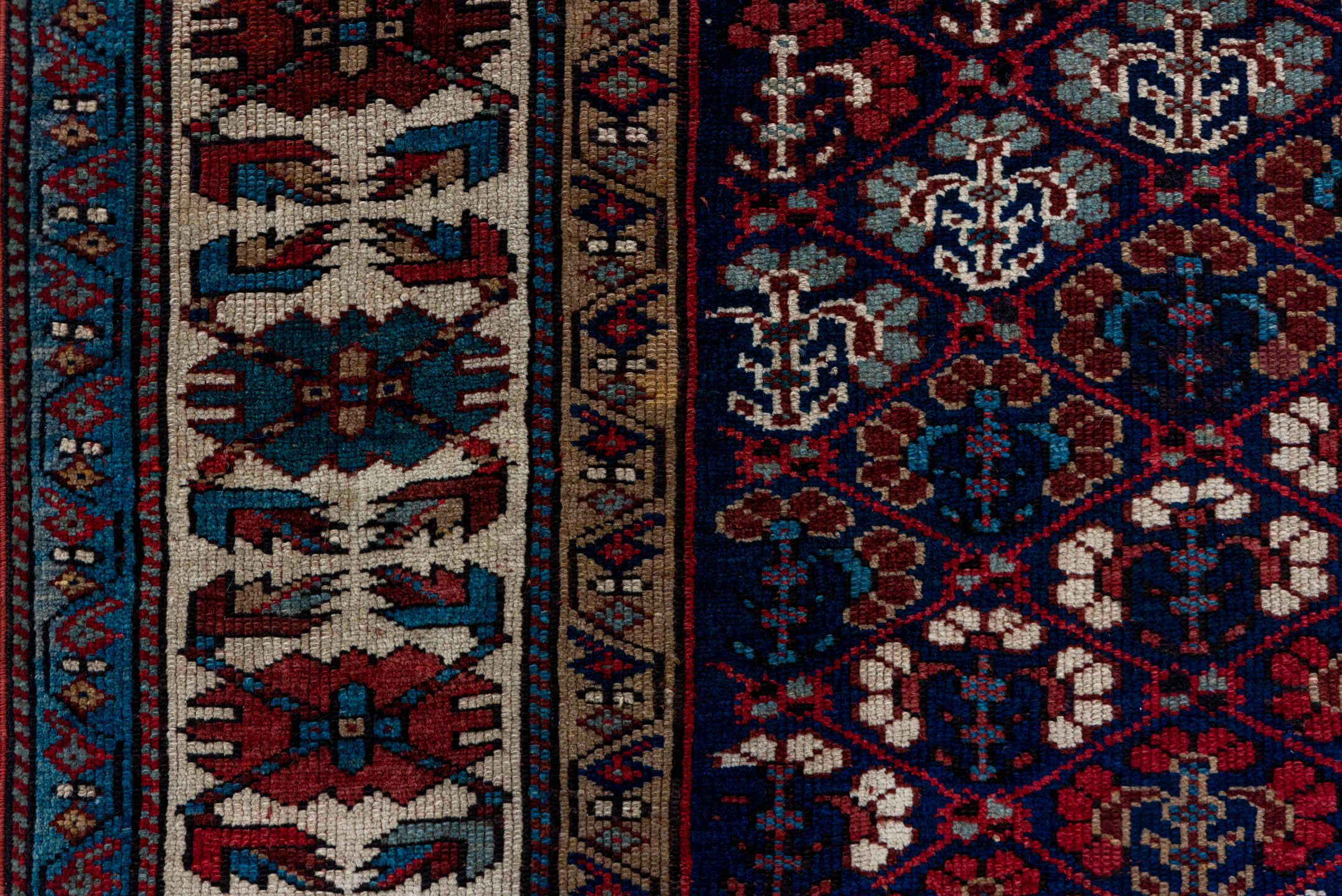 3' x 12' one-of-a-kind handmade antique NW Persian runner rug. Color palette: indigo, ivory, rust, sky blue, crimson, navy