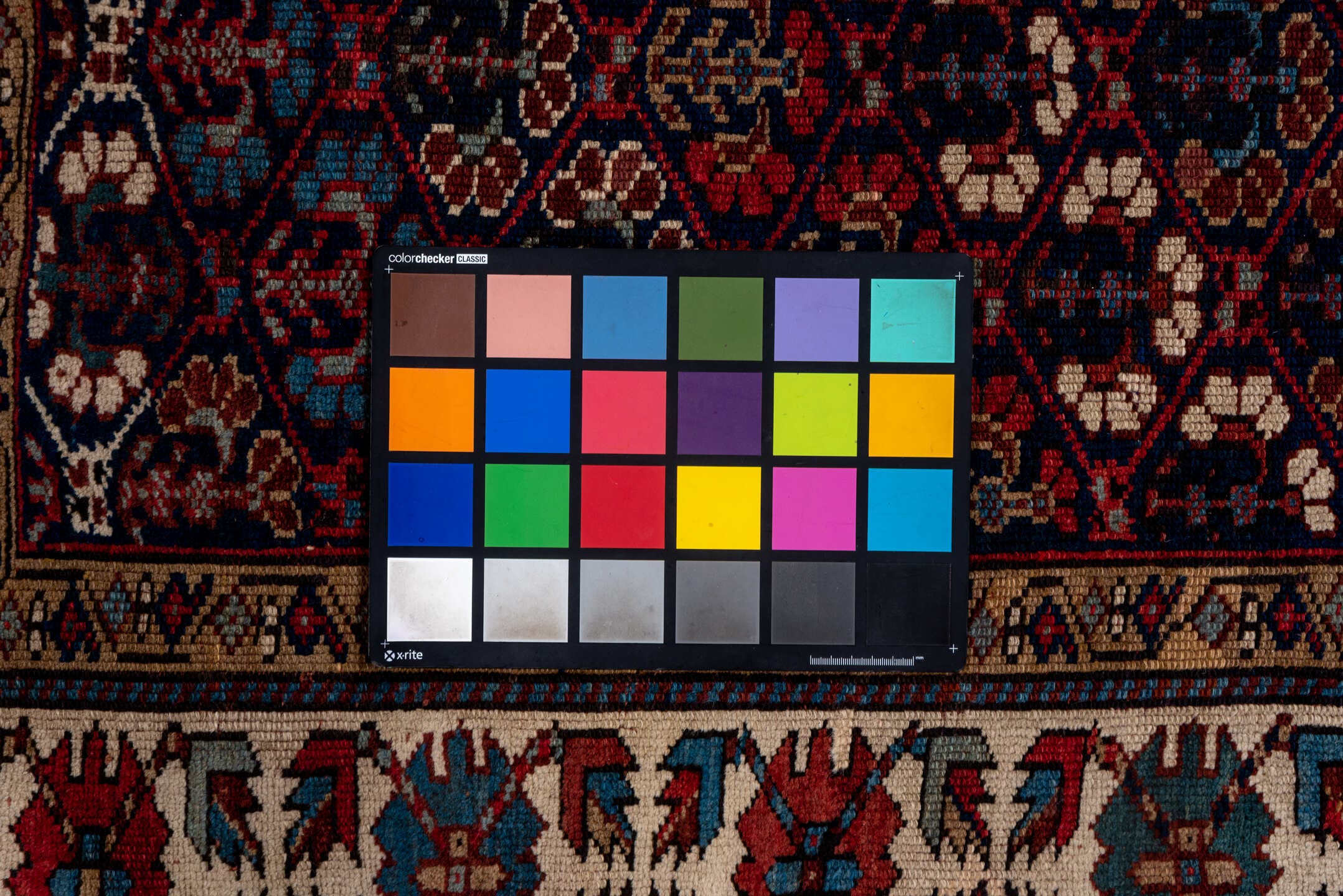 3' x 12' one-of-a-kind handmade antique NW Persian runner rug. Color palette: indigo, ivory, rust, sky blue, crimson, navy