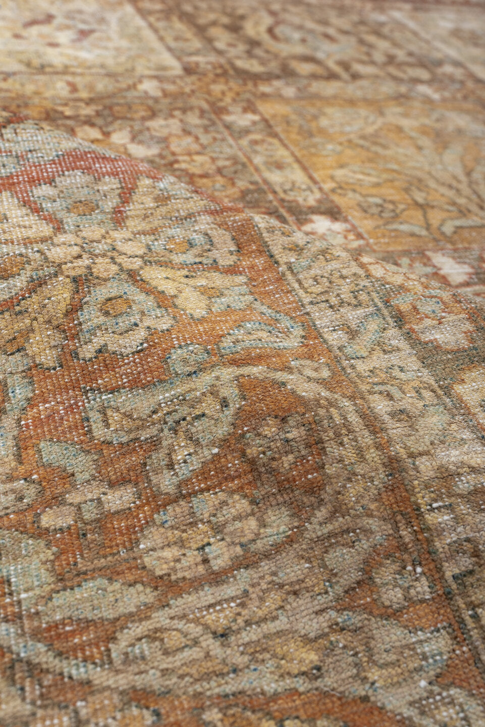 4' x 6' one-of-a-kind handmade antique Baktiary small size rug. Color palette: terracotta, ivory, pale blue, taupe, camel